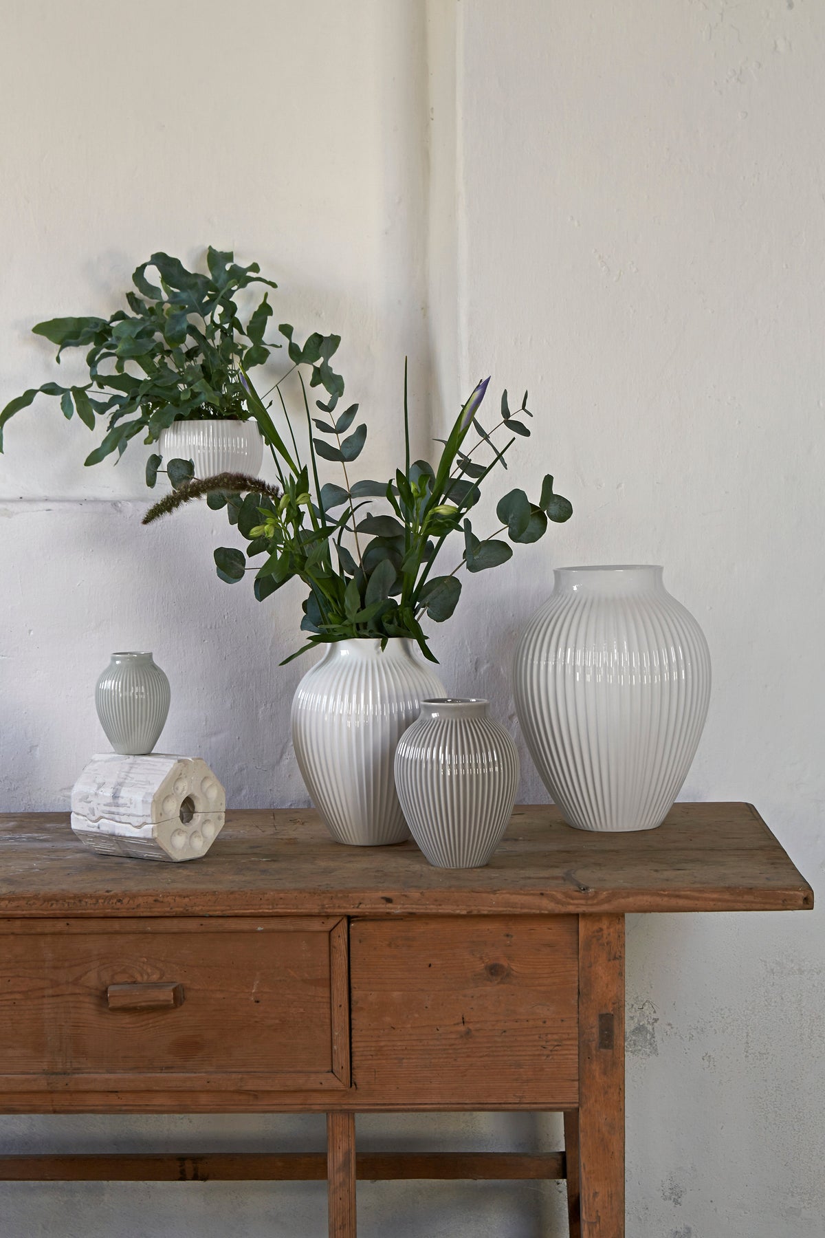 Knabstrup ripple vases in several glazes, styled in an interior setting, glazed earthenware