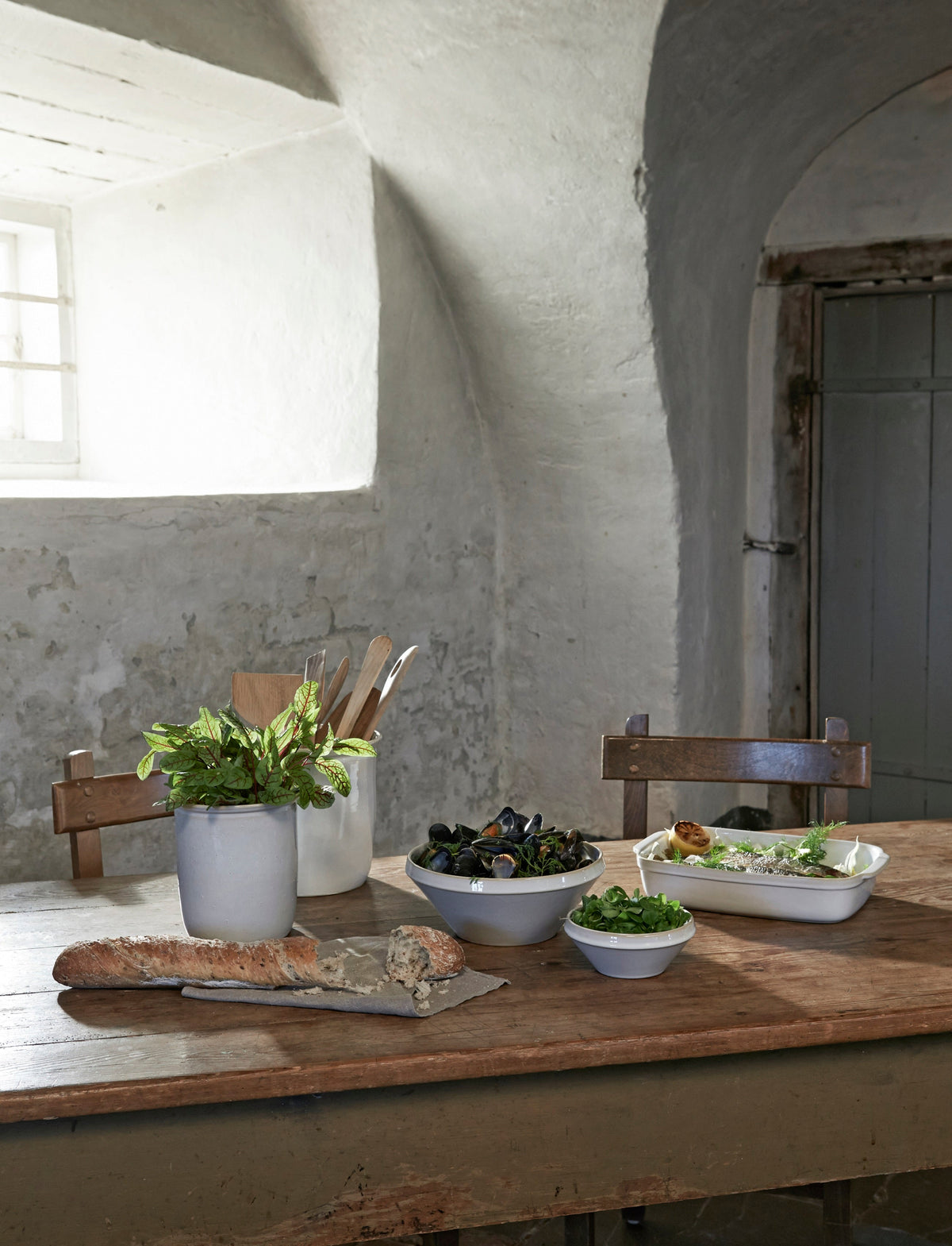 Knabstrup Tavola Pickle Jars (Set of 2) in white, styled in an interior setting, stoneware