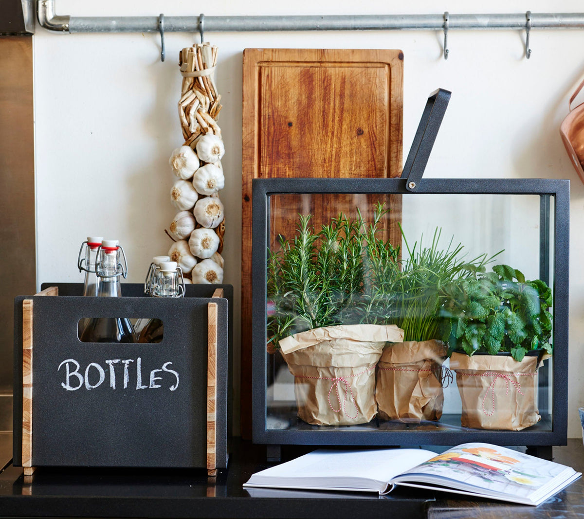 Cane-line Lighthouse Lantern Rectangular in Lava Grey used as a mini greenhouse for herbs, aluminum and glass