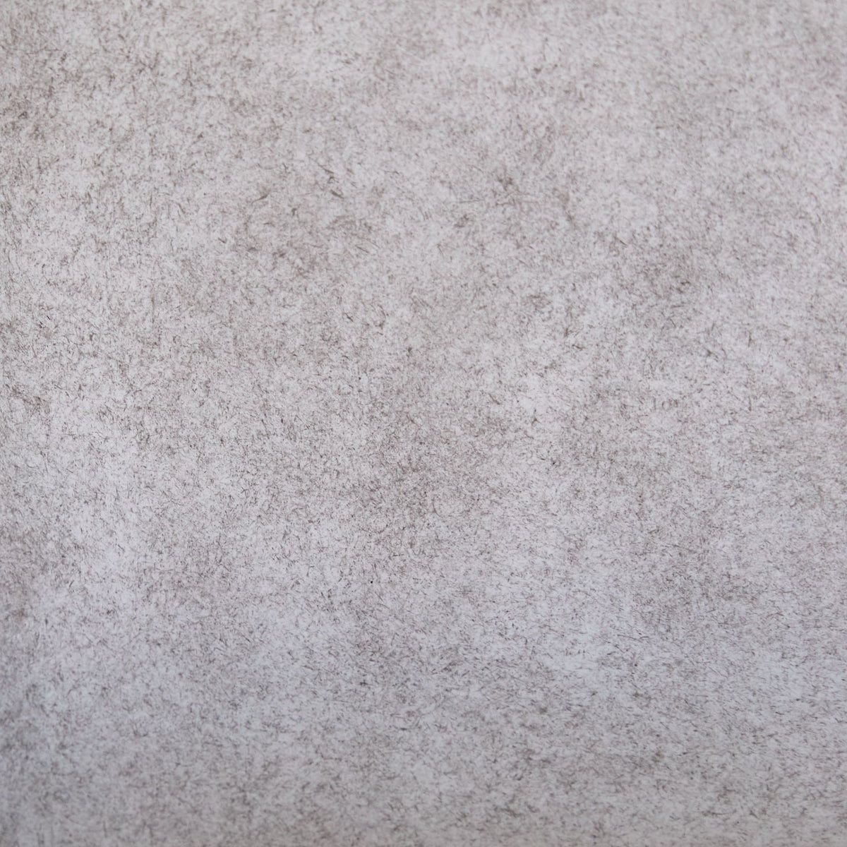 Tikamoon Sara grey concrete hook, close-up of the speckled surface