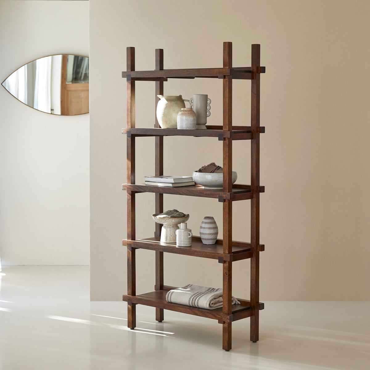 Tikamoon Arko dark mango bookcase, front view of the full height