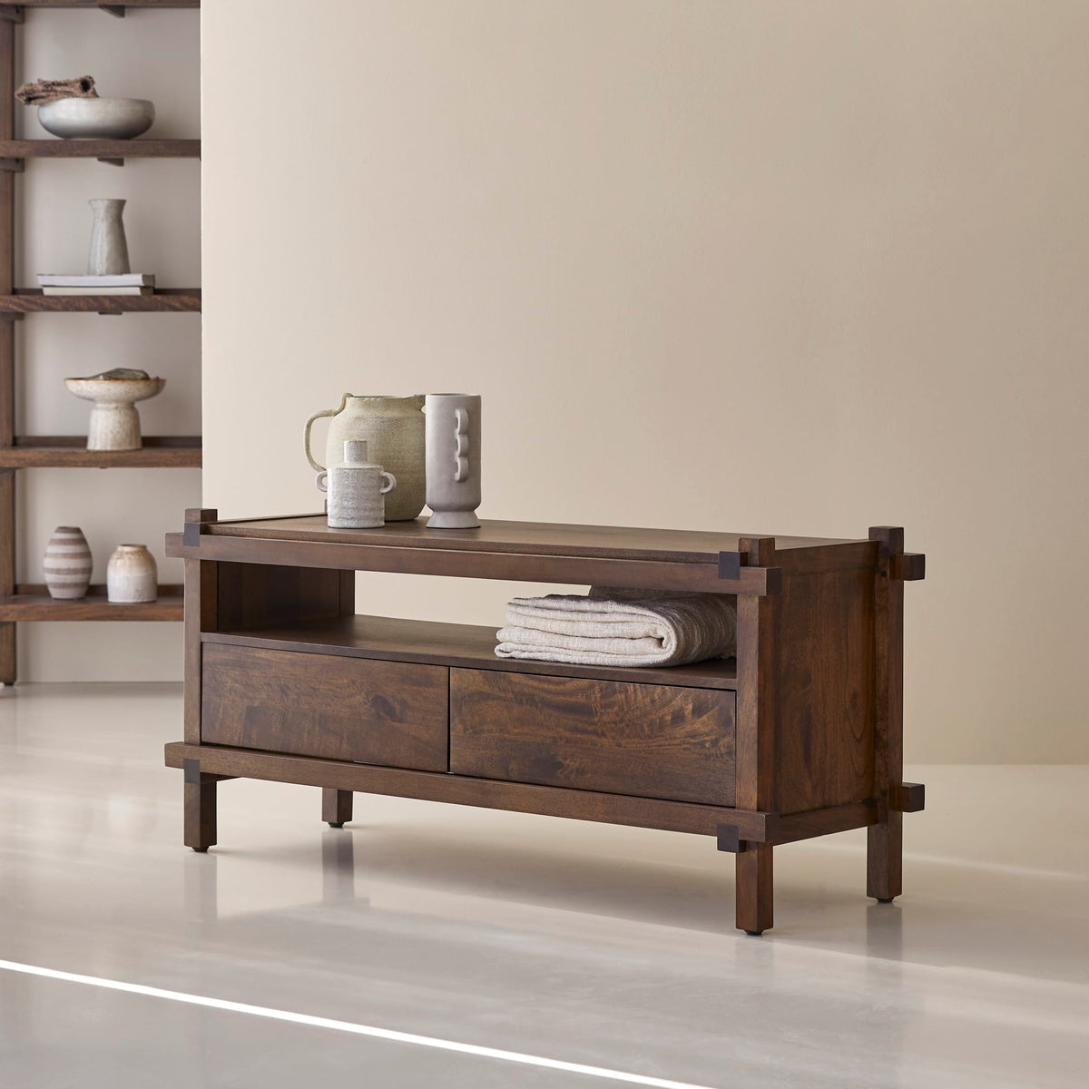 Tikamoon Arko mango TV stand, front view with the drawers closed
