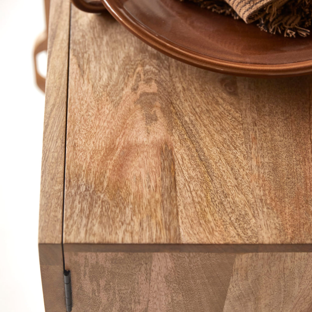 Tikamoon Sina mango and rattan sideboard, close-up of the woven door panel