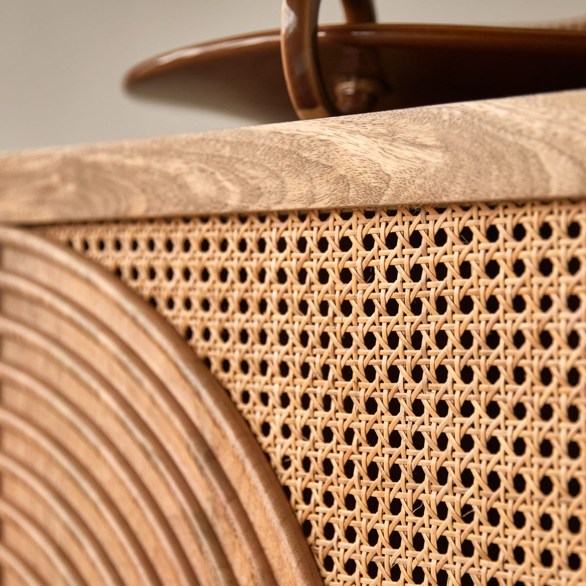 Tikamoon Sina mango and rattan sideboard, interior storage view