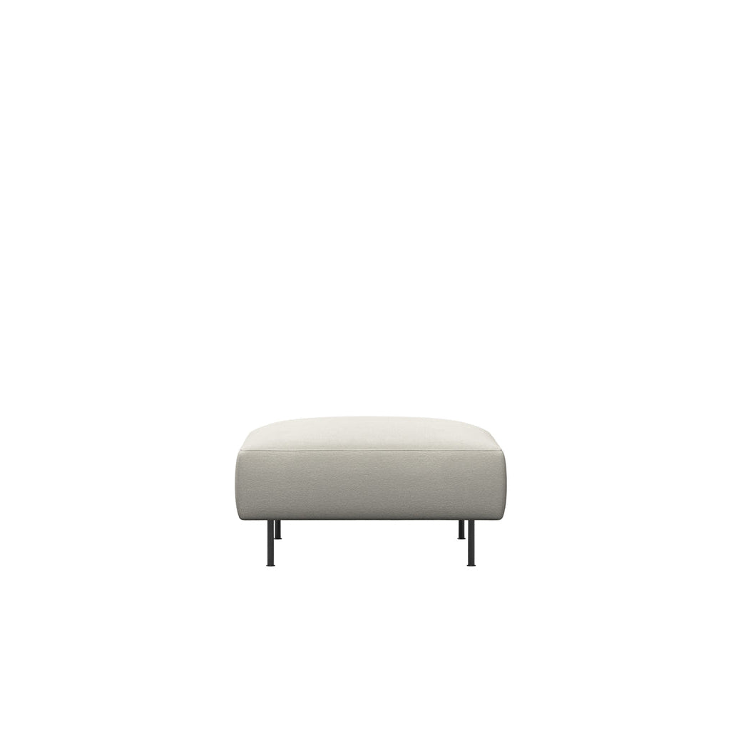 WOUD Collar Ottoman in white upholstered fabric on a wood frame designed by Yonoh studio, Danish design