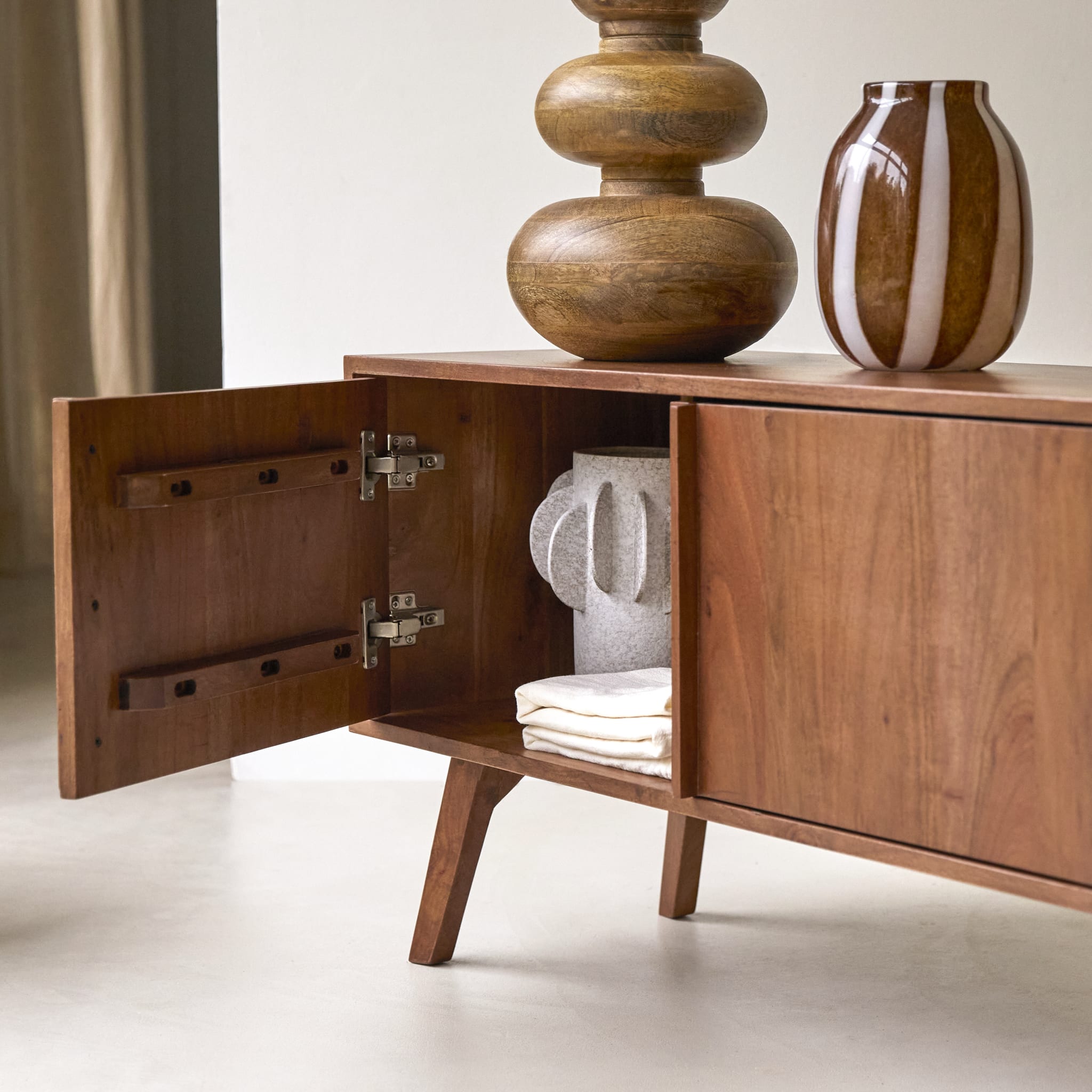 Tikamoon Niels TV stand in solid acacia wood, three-quarter view
