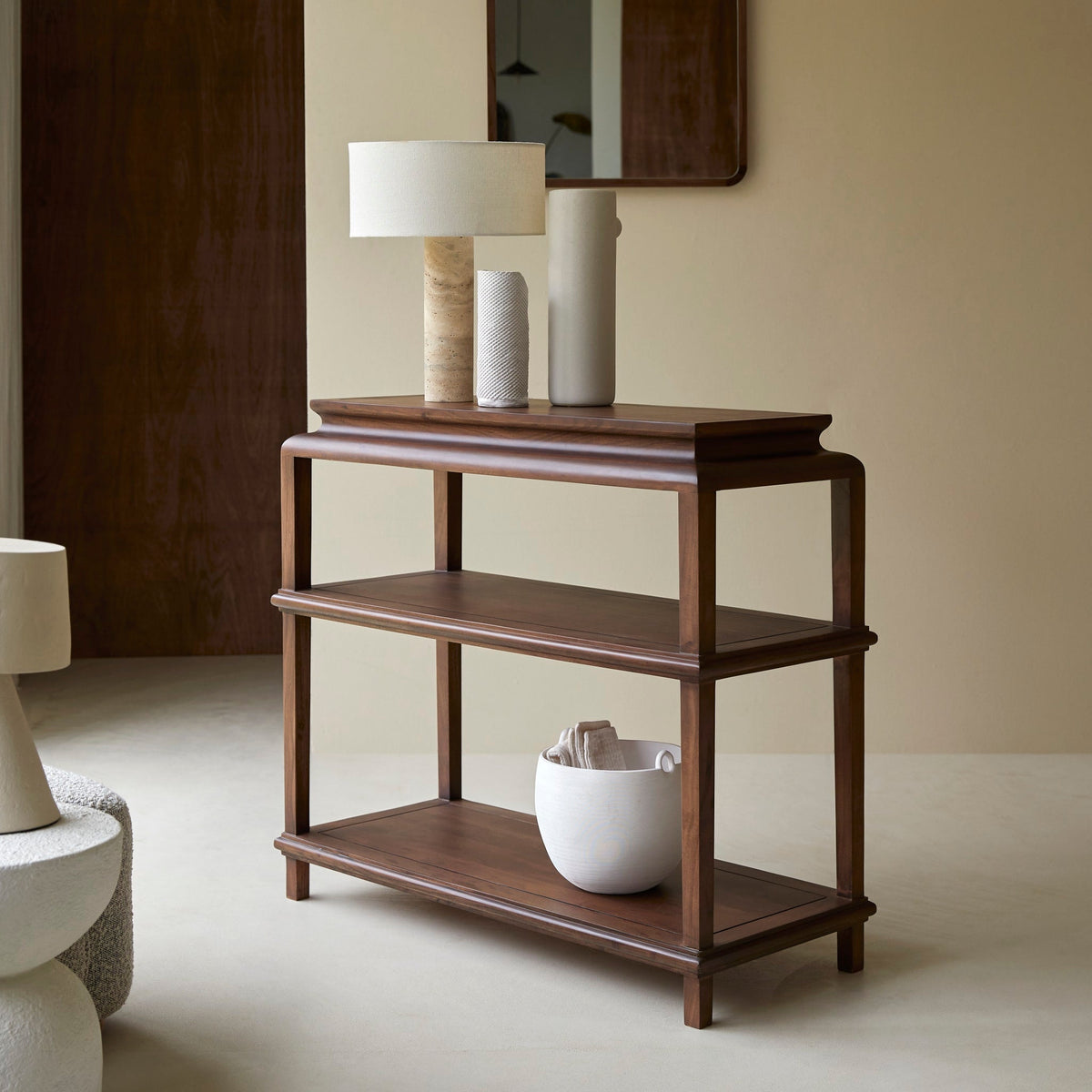 Tikamoon Achille acacia console with a lamp and vases on top