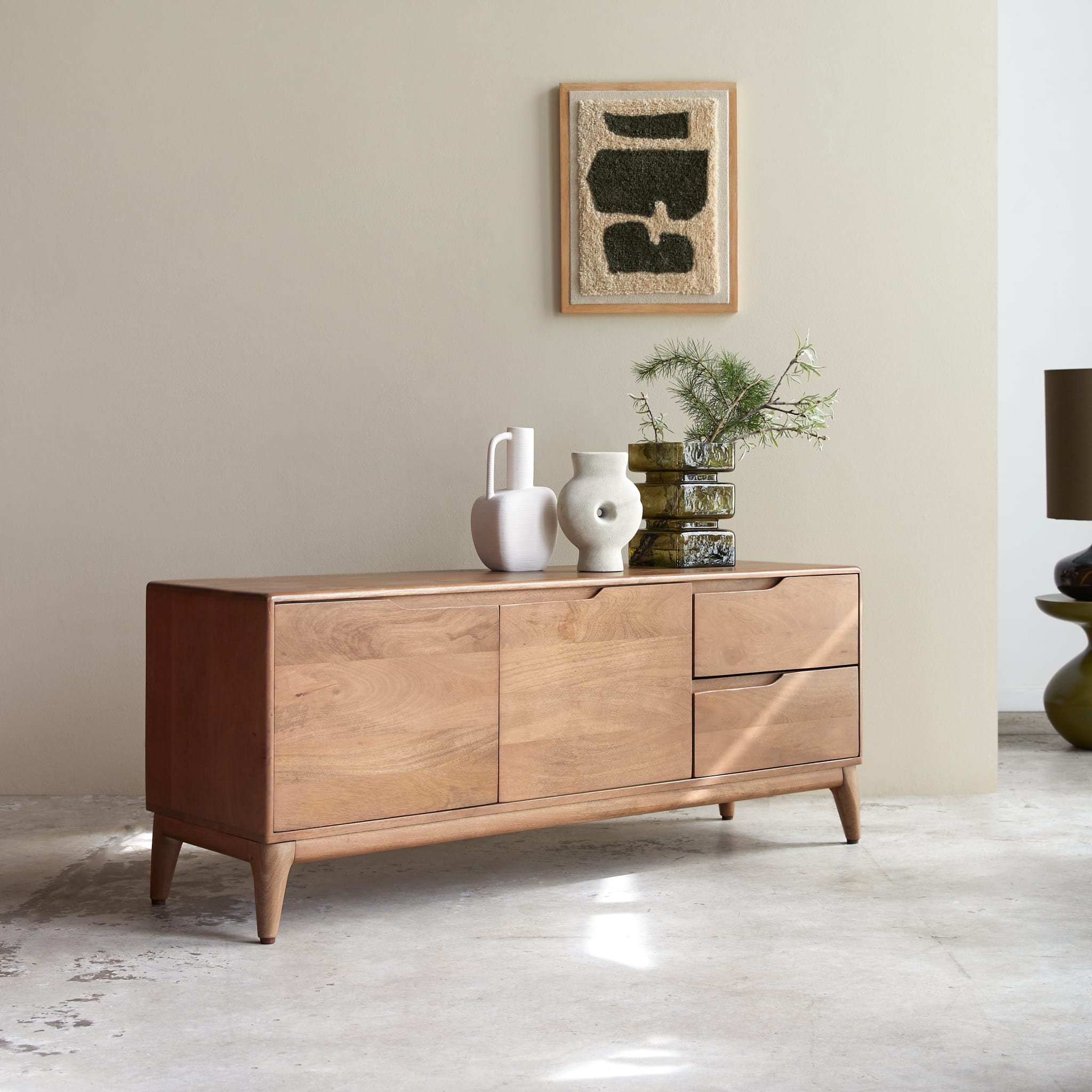 Tikamoon Gabrielle TV stand in solid mango wood, angled view