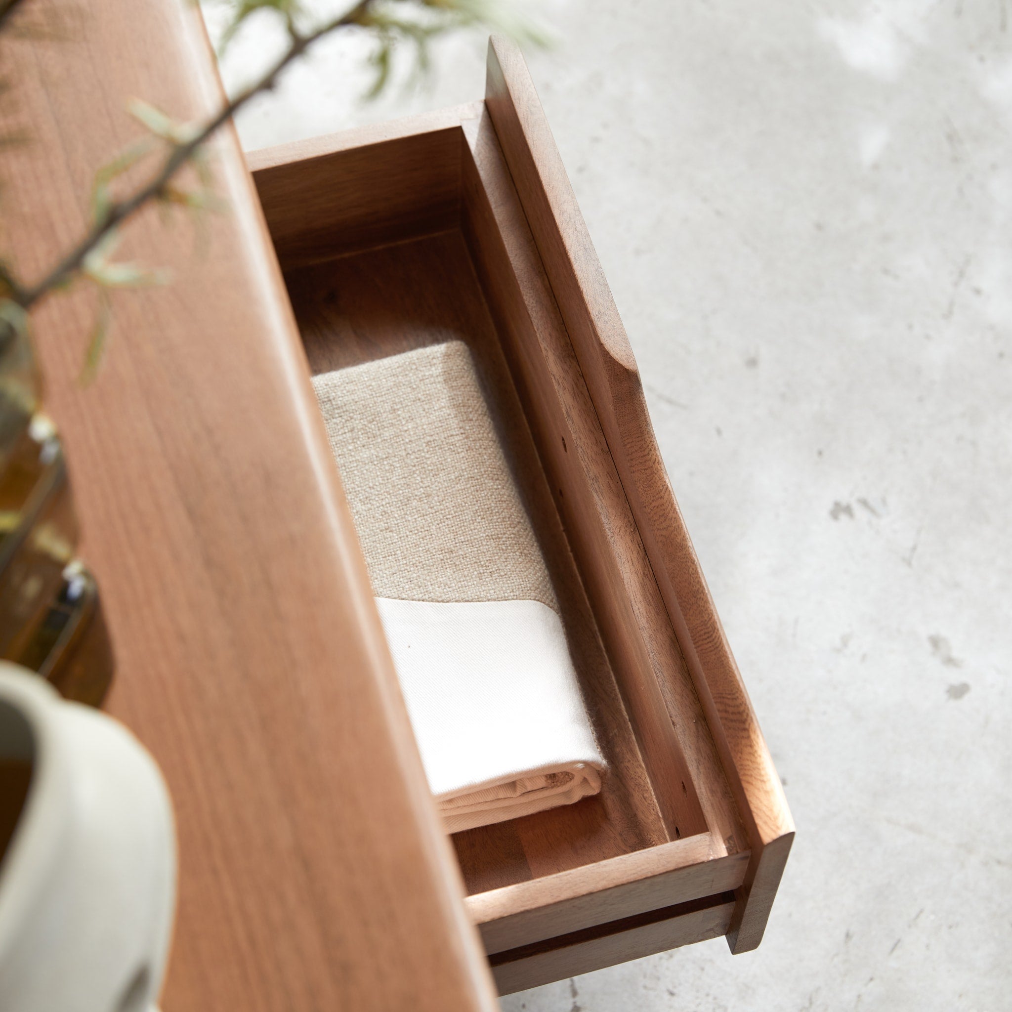 Tikamoon Gabrielle TV stand in solid mango wood, side view