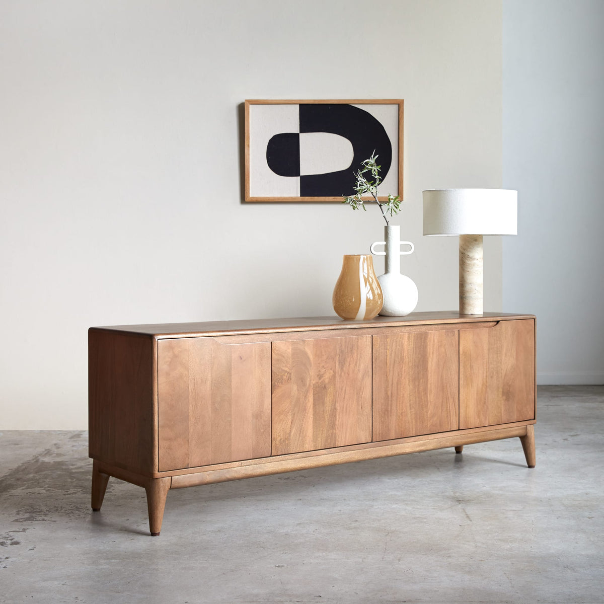 Tikamoon Gabrielle TV stand in solid mango wood, three-quarter view