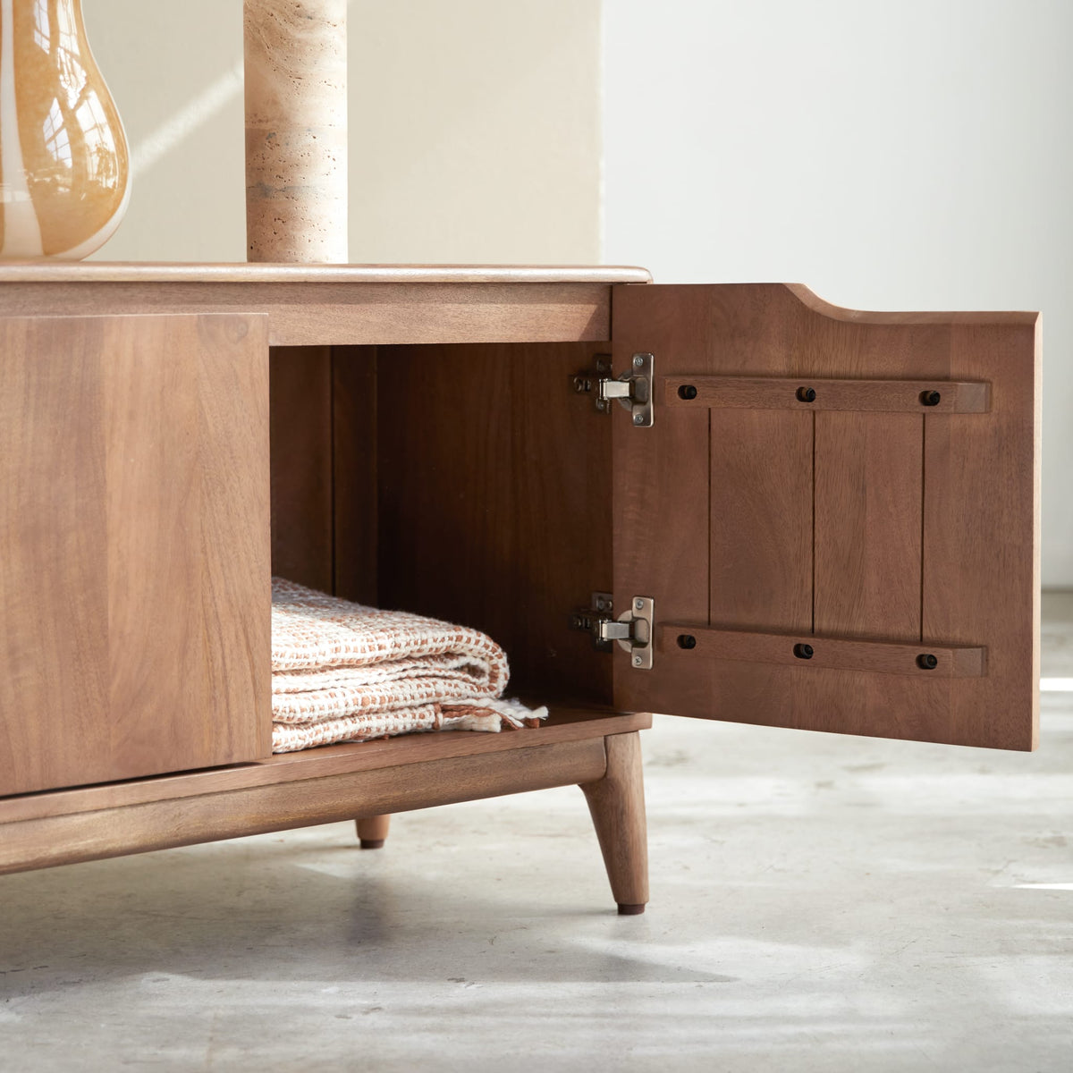 Tikamoon Gabrielle mango wood TV stand, close-up of a notched door handle