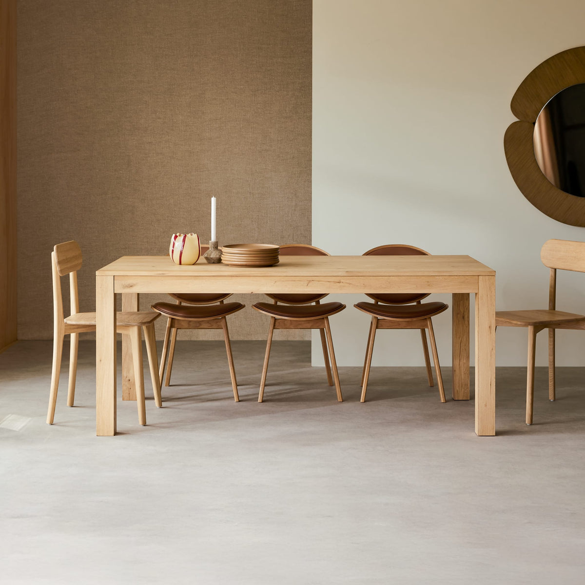 Tikamoon Eden extendable dining table in solid oak, three-quarter view