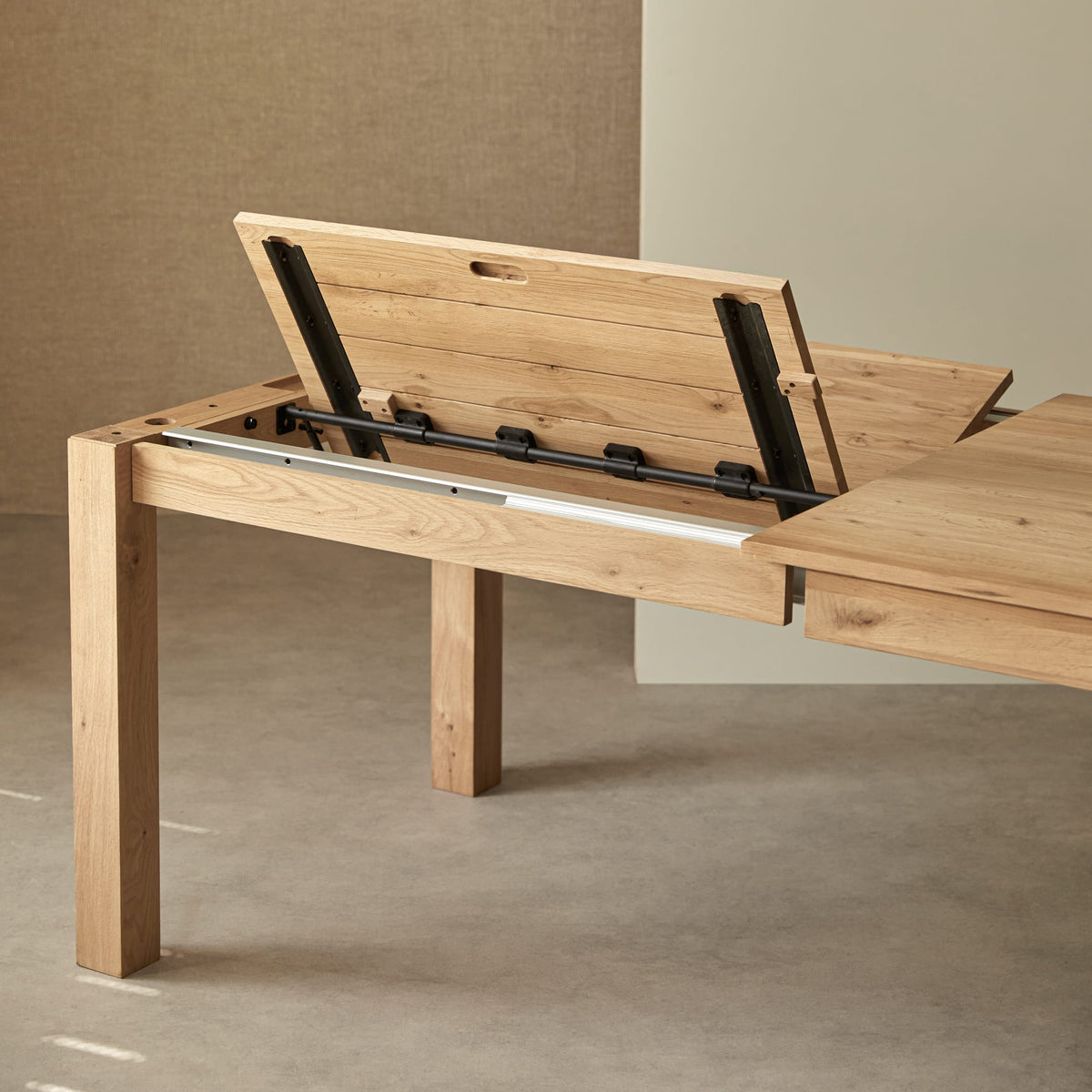 Tikamoon Eden extendable dining table in solid oak, diagonal view