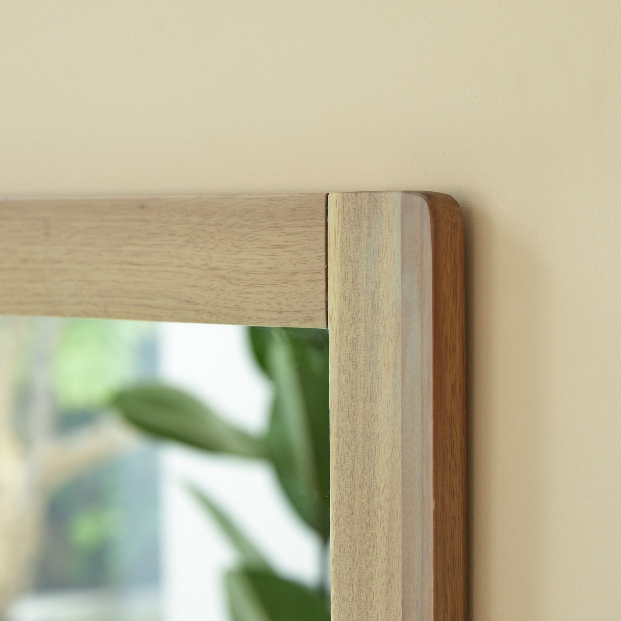 Tikamoon Lila mirror in solid acacia wood, angled view