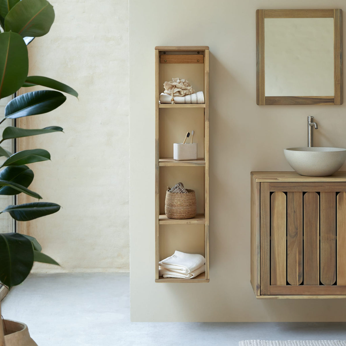 Tikamoon Lila wall-mounted column cabinet in solid acacia, angled view