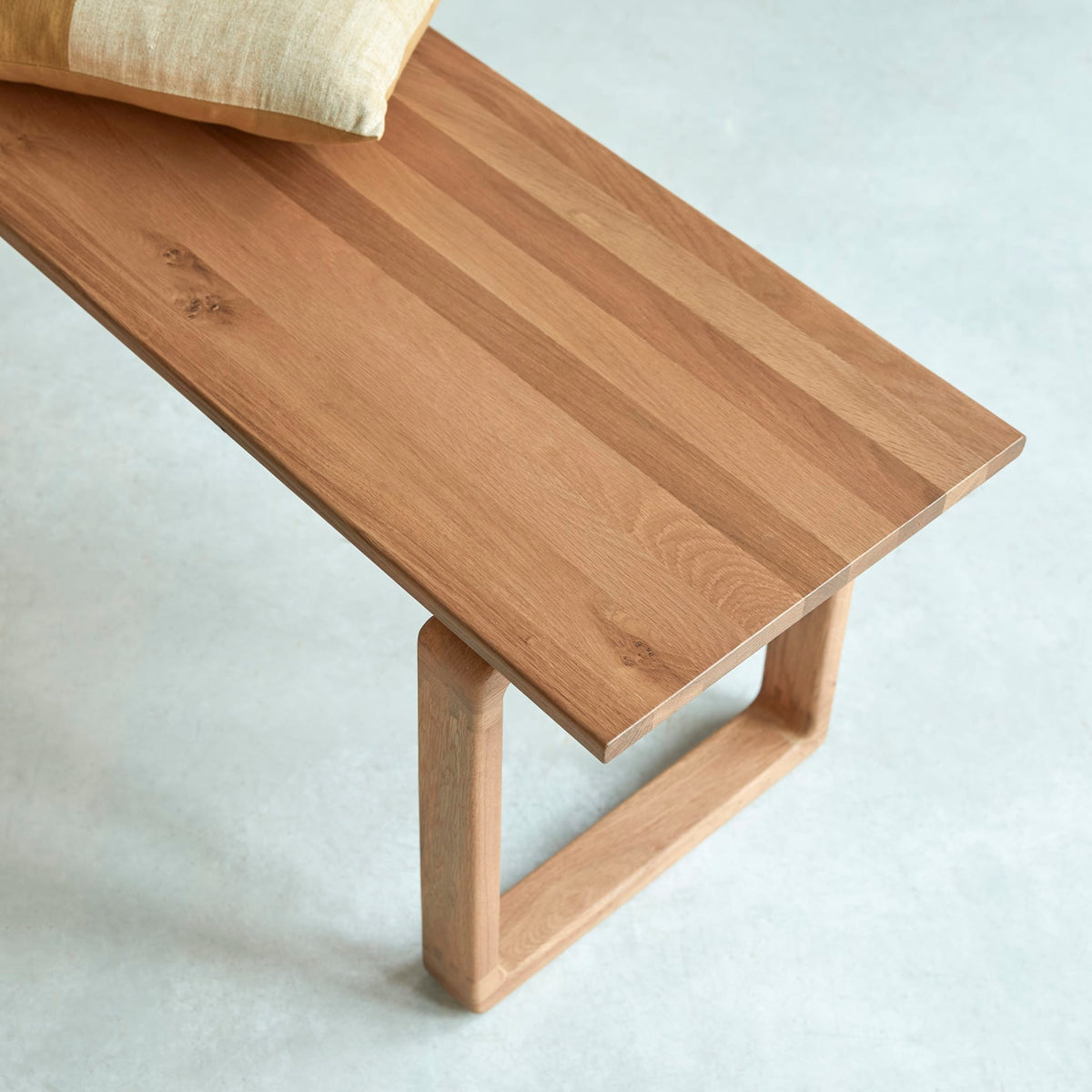 Tikamoon Sybille solid oak bench, detail of the leg and seat junction
