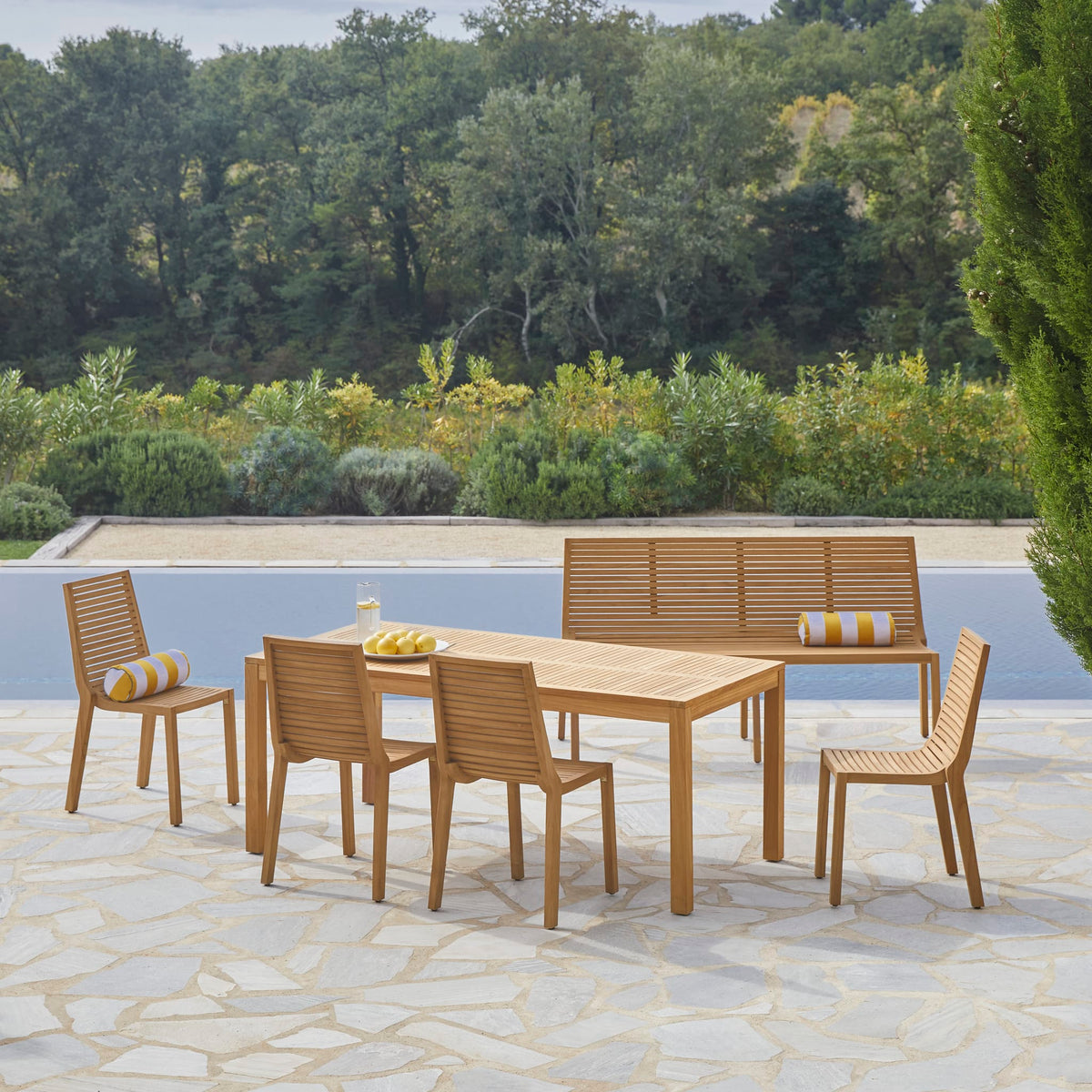 Tikamoon Téo teak outdoor table with bench and four chairs, side view