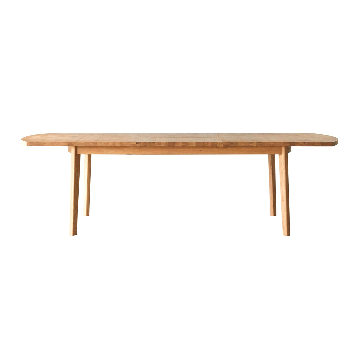 Tikamoon Maia extendable oak dining table styled in a dining room