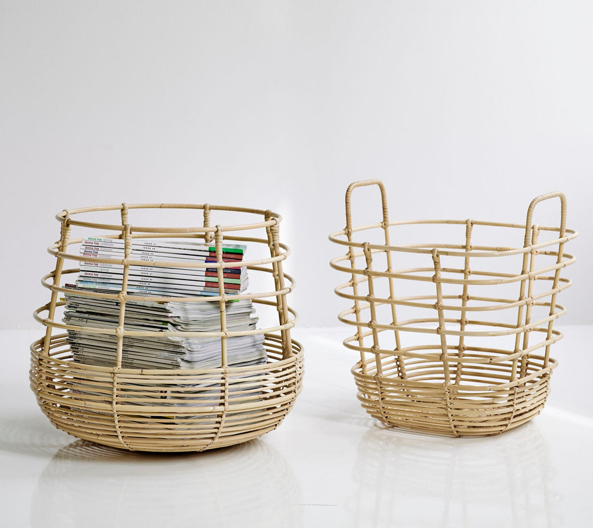 Cane-line Sweep Square Basket beside the round Sweep in natural rattan, styled in an interior setting