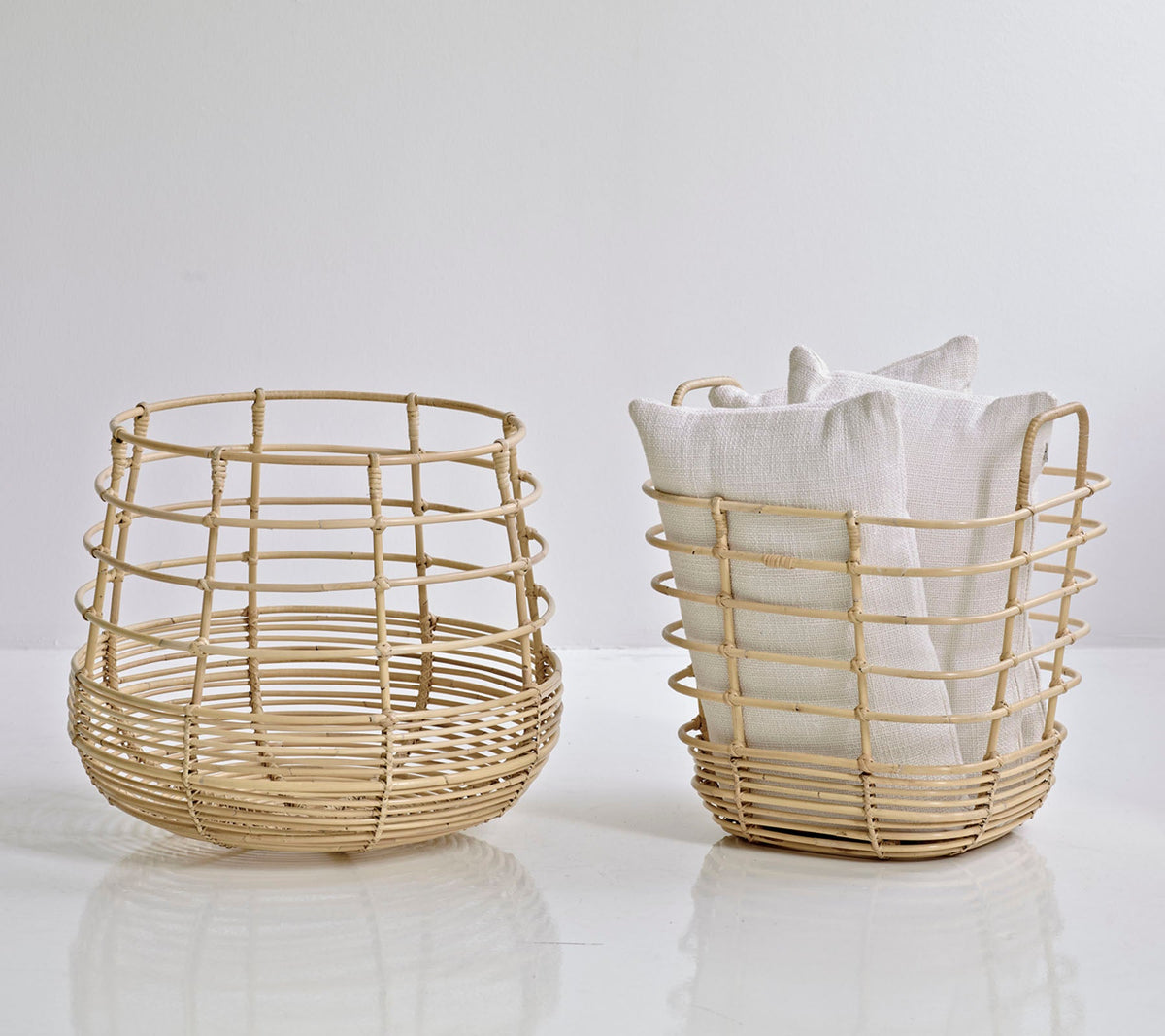 Cane-line Sweep Square and Round Baskets in natural rattan, styled in an interior setting