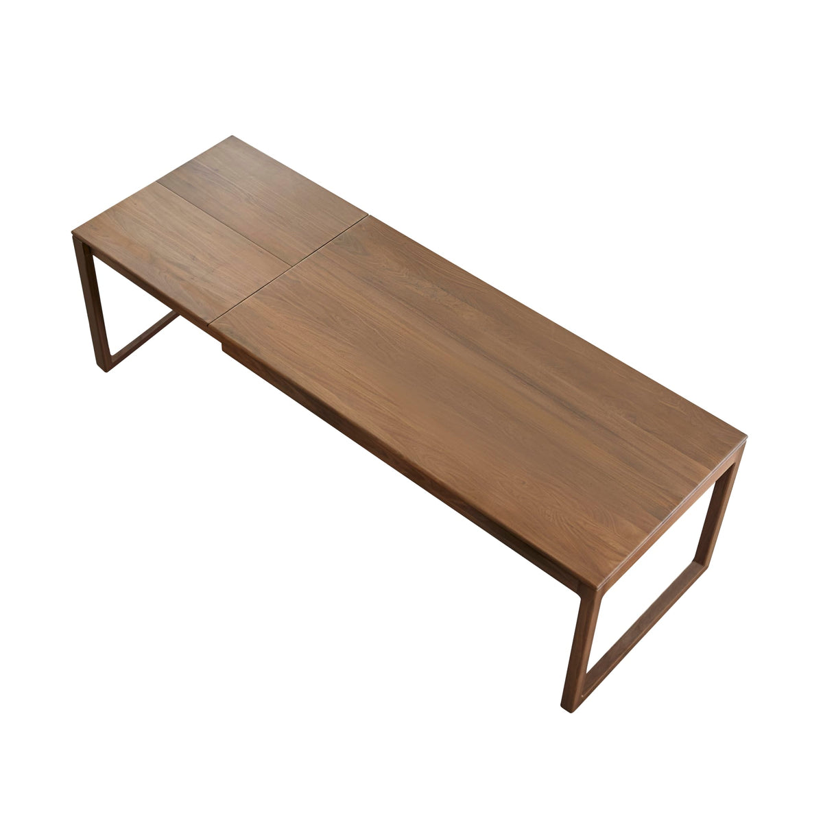 Tikamoon Arto extendable dining table in solid walnut, styled in a dining room