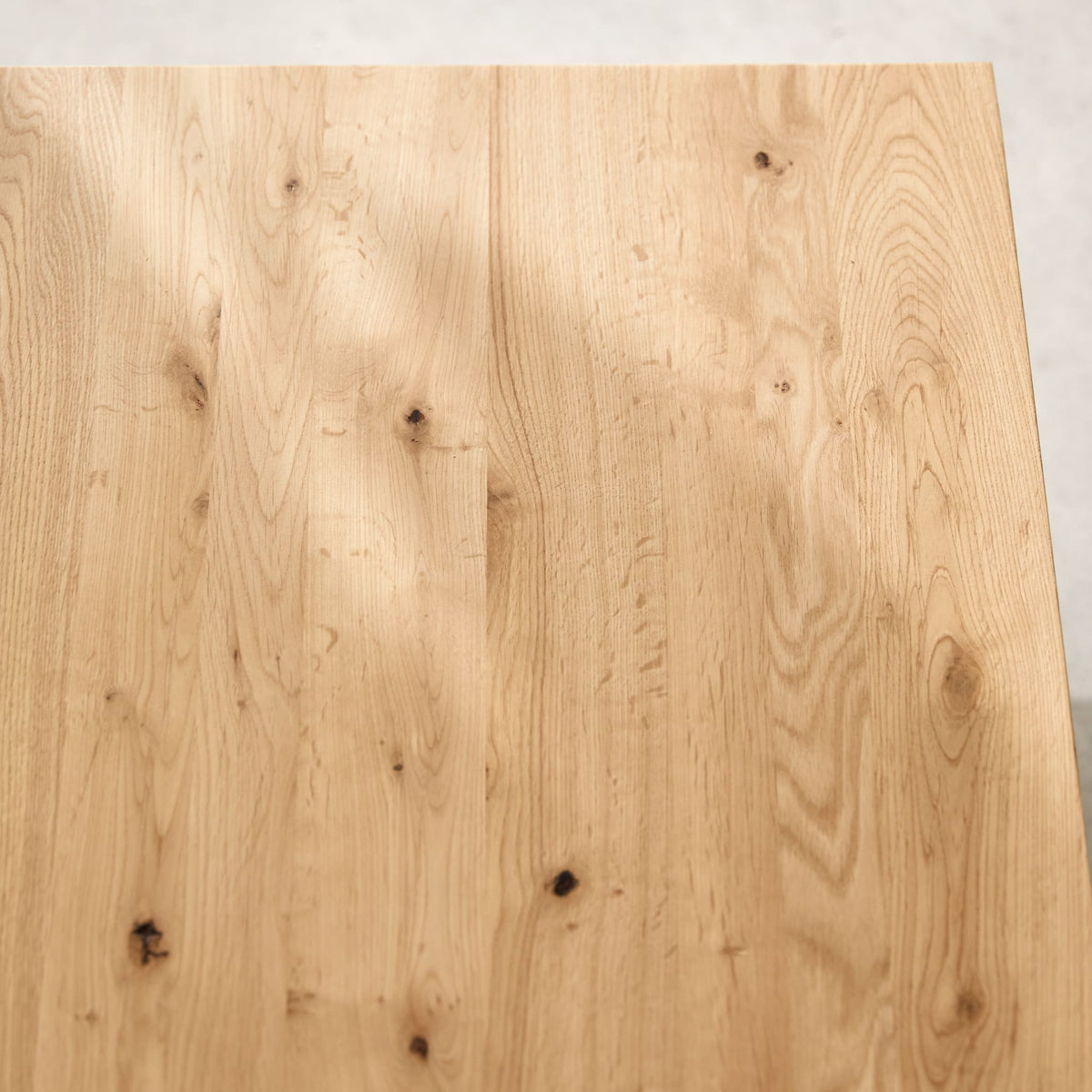 Tikamoon Anoa oak coffee table, overhead view of the square top