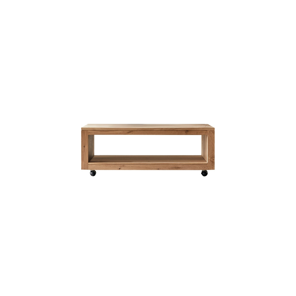 Tikamoon Anoa rectangular coffee table in solid oak, styled beside a sofa