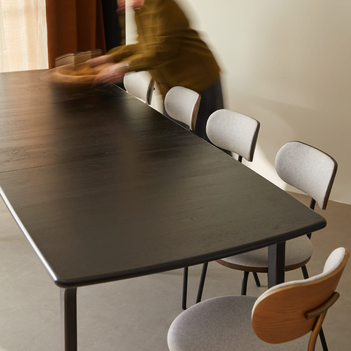 Tikamoon Clara black-stained oak table top being set for dinner