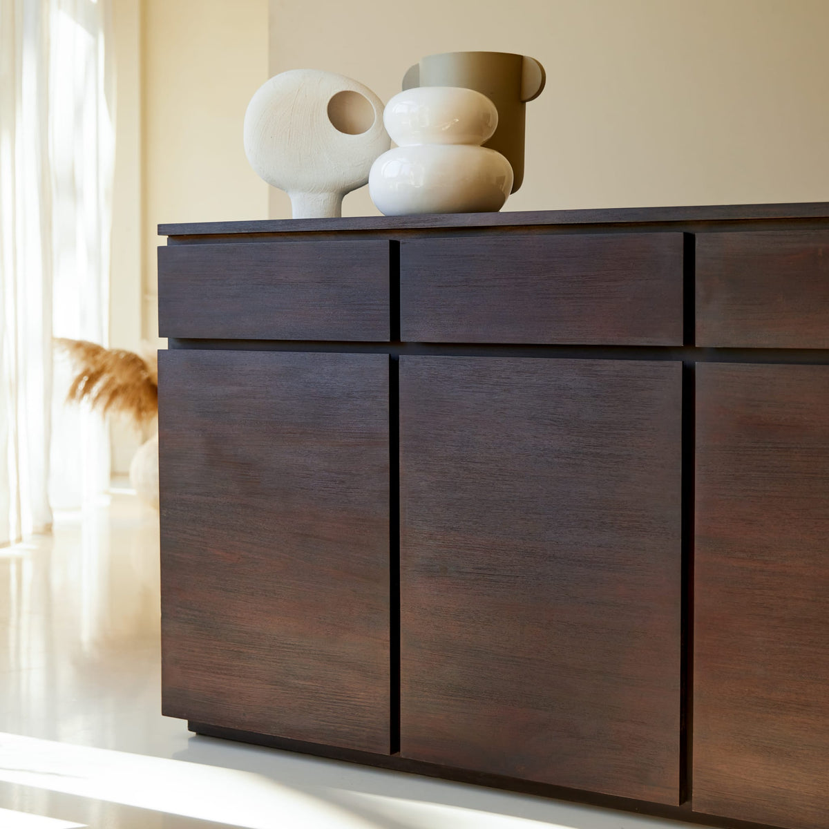 Tikamoon Eva mahogany sideboard, detail of the cabinet fronts