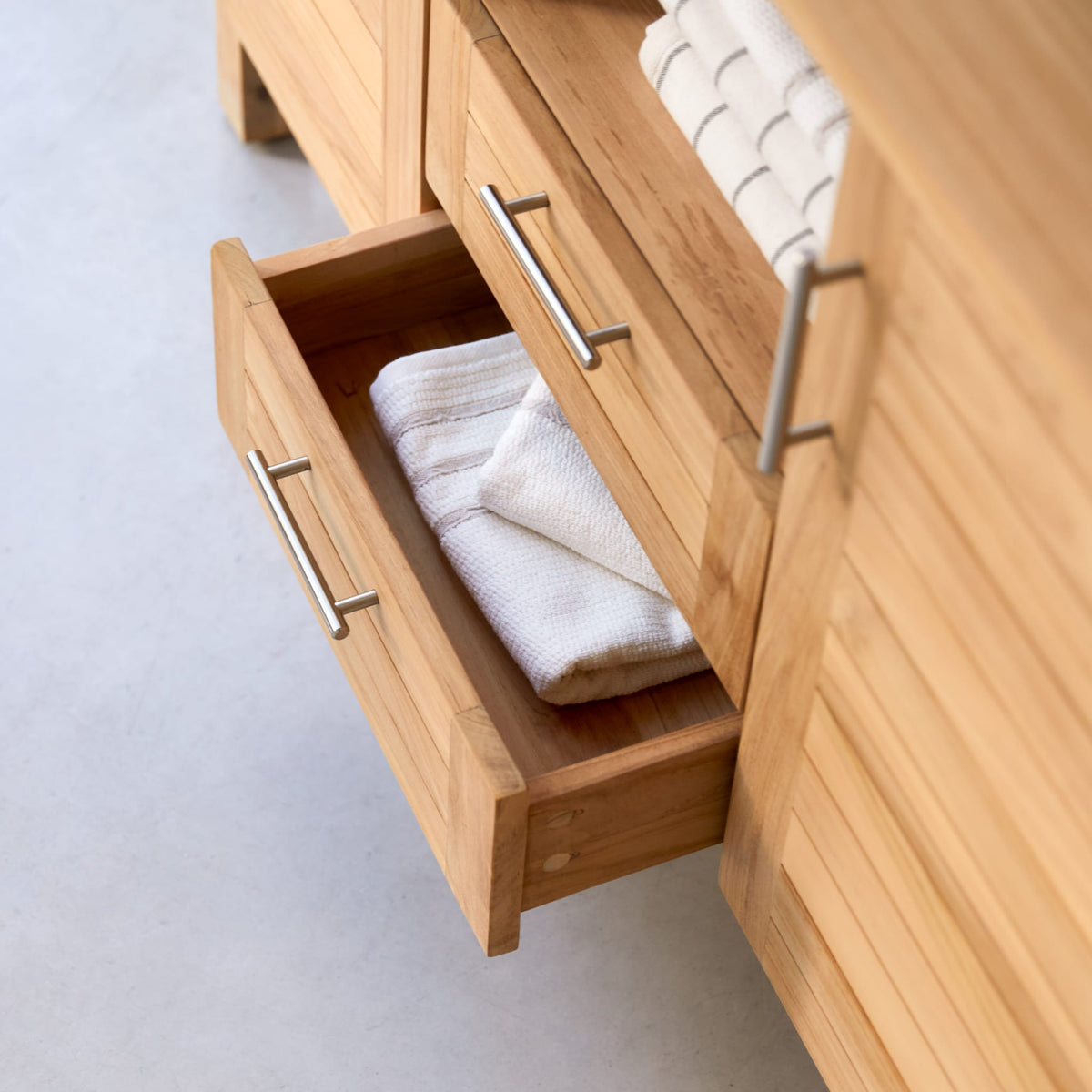 Tikamoon Soho teak vanity cabinet, detail of the teak grain