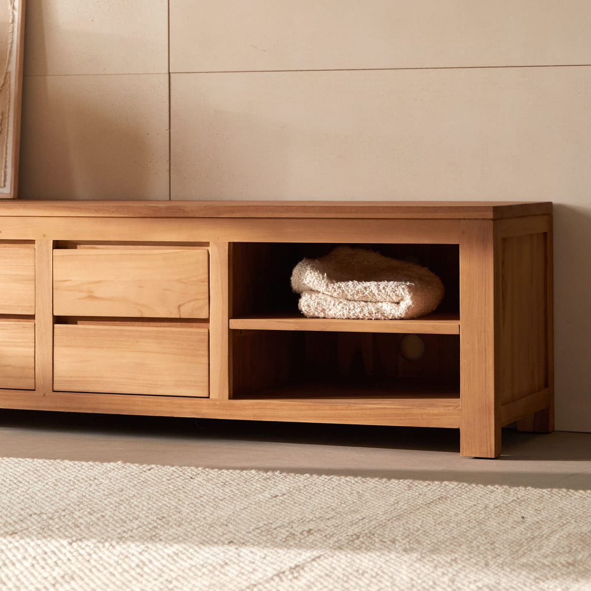 Tikamoon Patio TV stand in solid teak, close-up of the teak grain