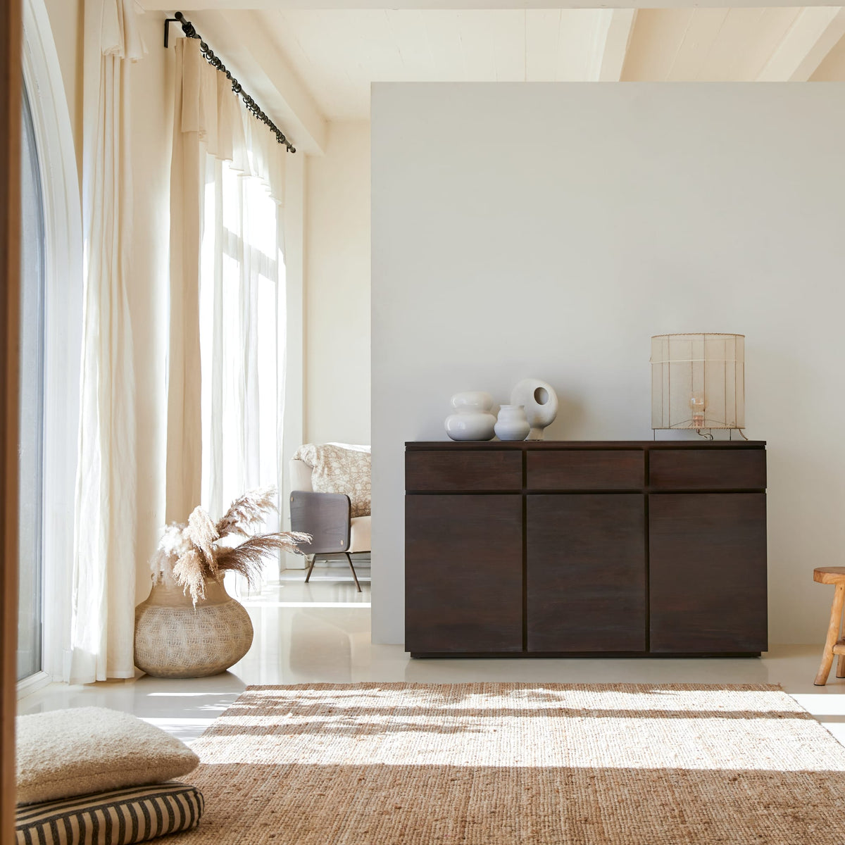 Tikamoon Eva sideboard in solid mahogany, angled view