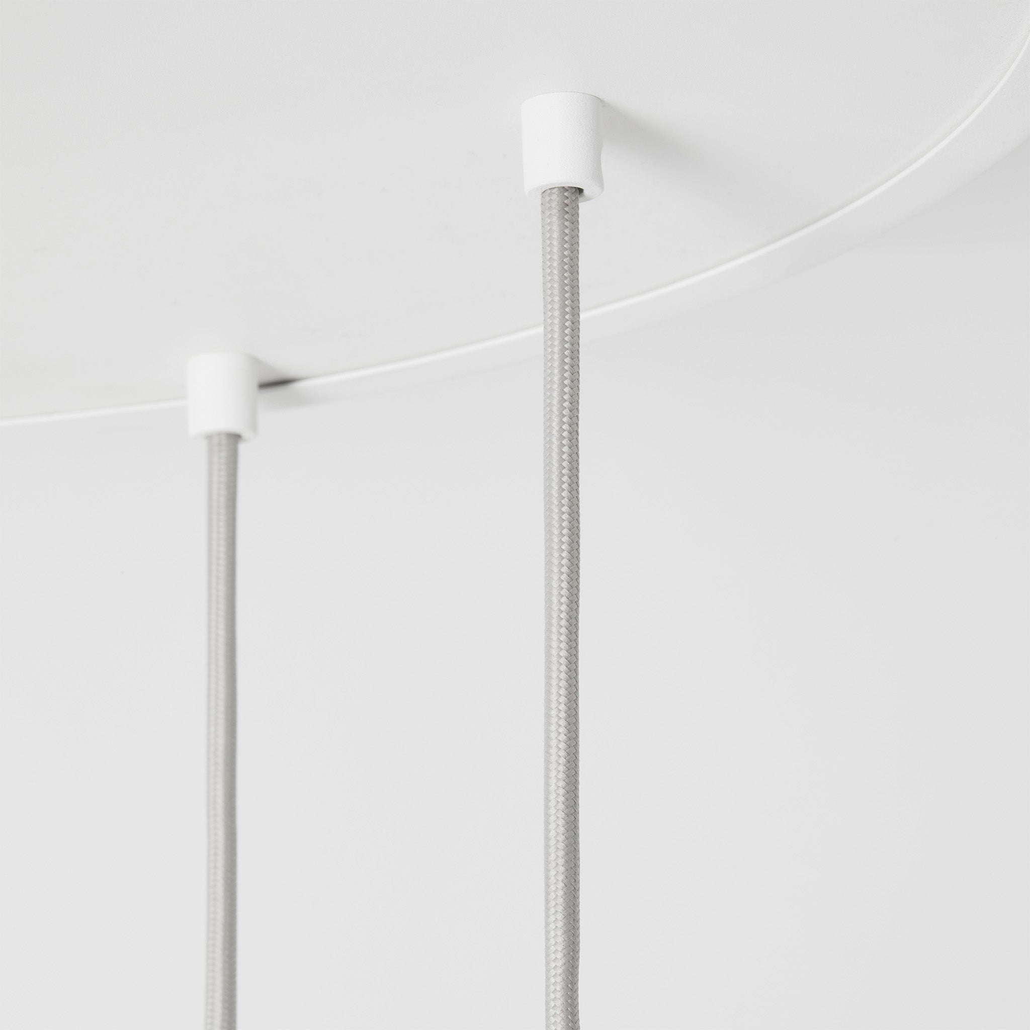 Tala Alumina Nine Pendant with Sphere V bulbs in Chalk, close-up of aluminium finish