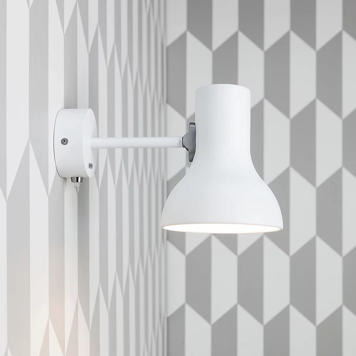 Anglepoise Type 75 Mini wall light in Alpine White on patterned gray wallpaper