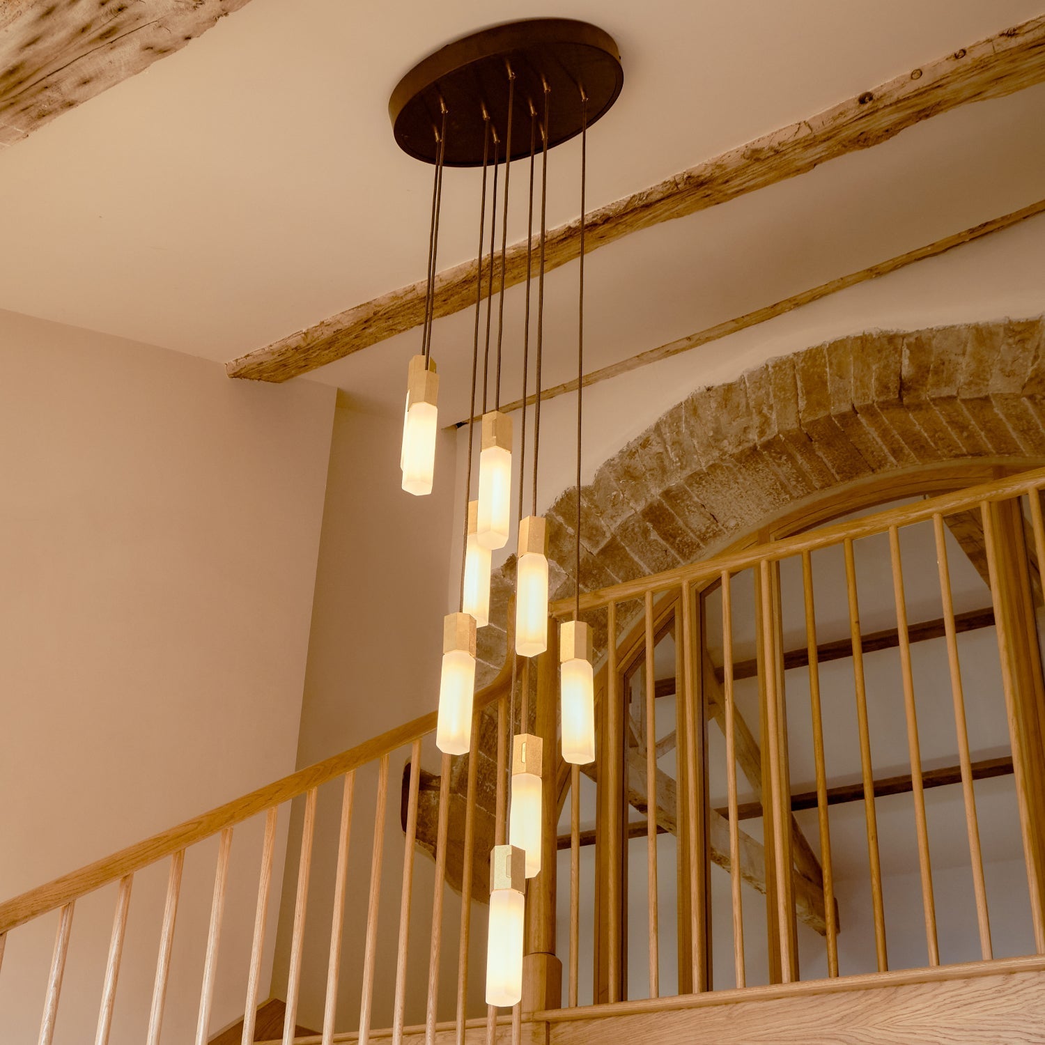 Basalt Nine Pendant by Tala in Brass, side profile of the nine-pendant array