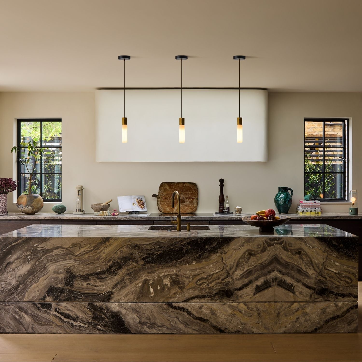 Basalt Single Pendant by Tala in Brass, detail of the exposed Tala logo cast mark