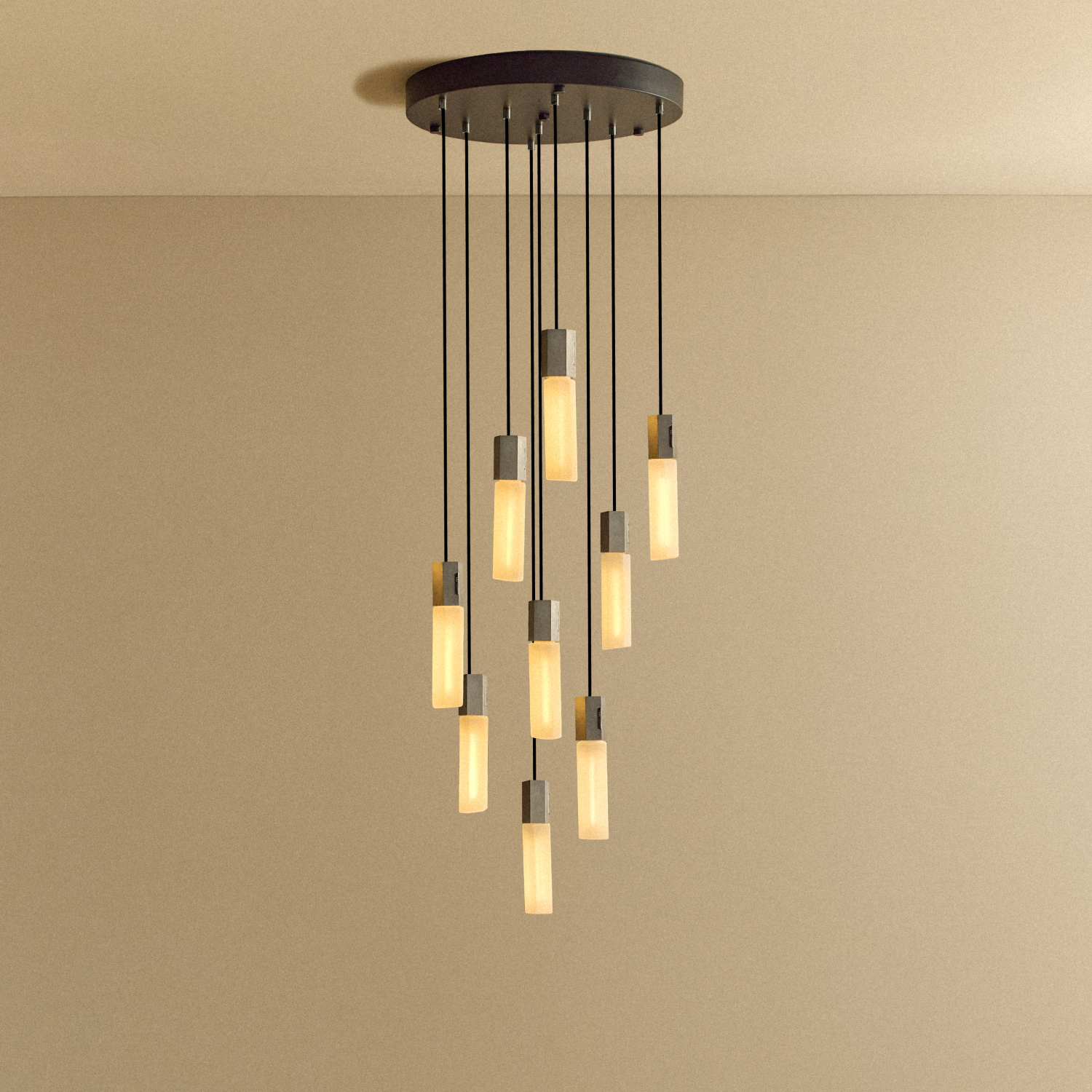 Basalt Nine Pendant by Tala in cast Stainless Steel, front view of the nine-light fixture