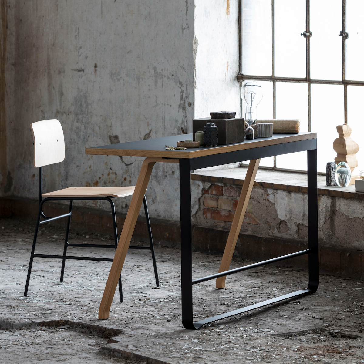 Bent Hansen Hemingway Desk in black linoleum and oak, styled in an interior setting, oak and steel