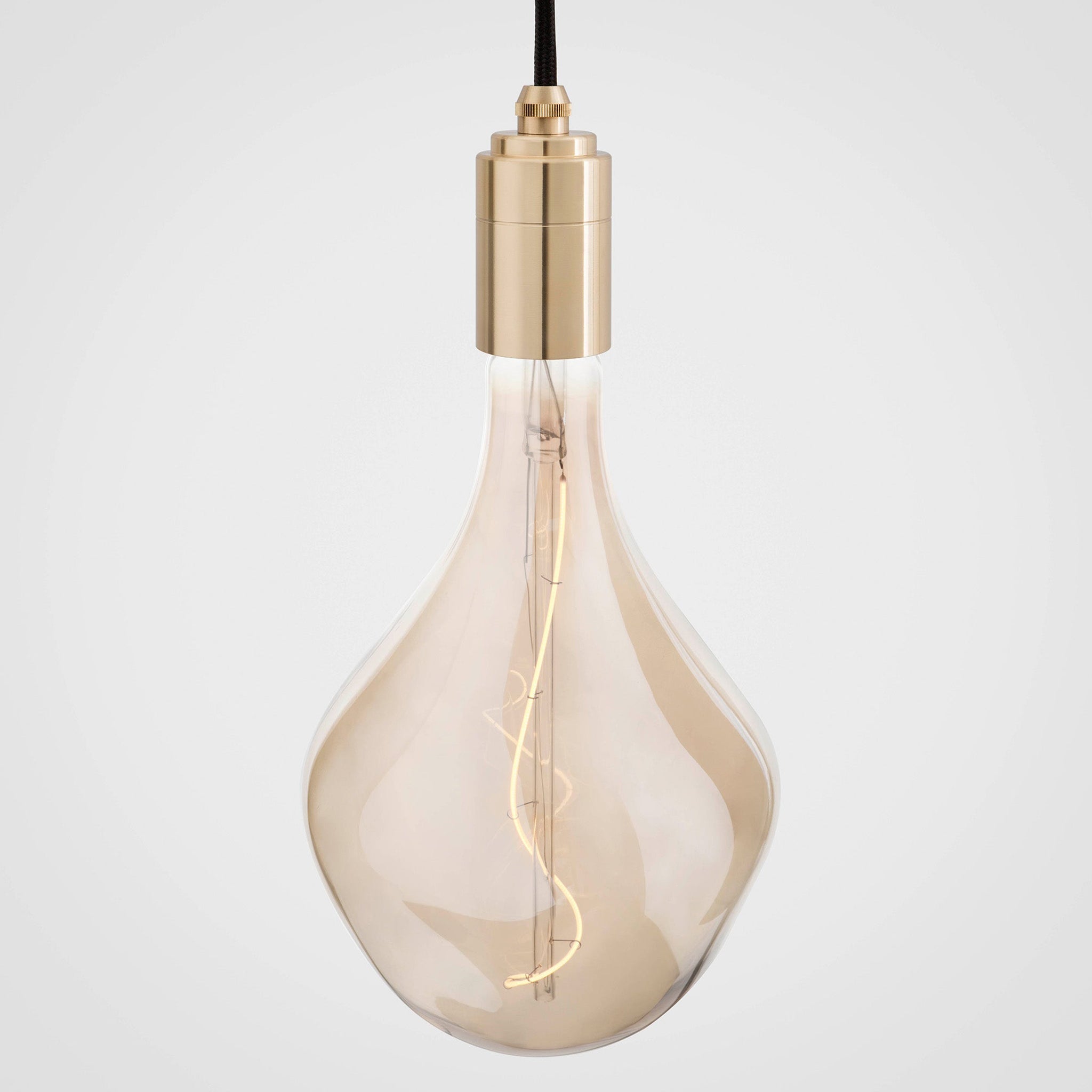 Voronoi II bulb in Brass pendant, lit, grey background