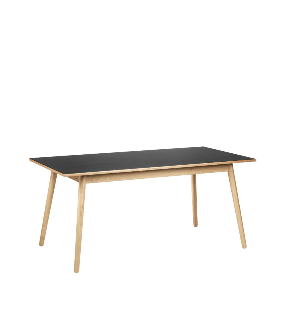 FDB Møbler Dining table in black-stained solid oak, designed by Poul M. Volther