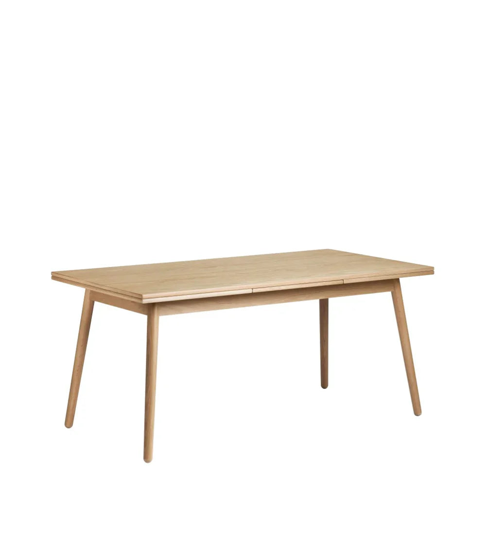 FDB Møbler Dining table With Dutch extract in solid oak, designed by Poul M. Volther