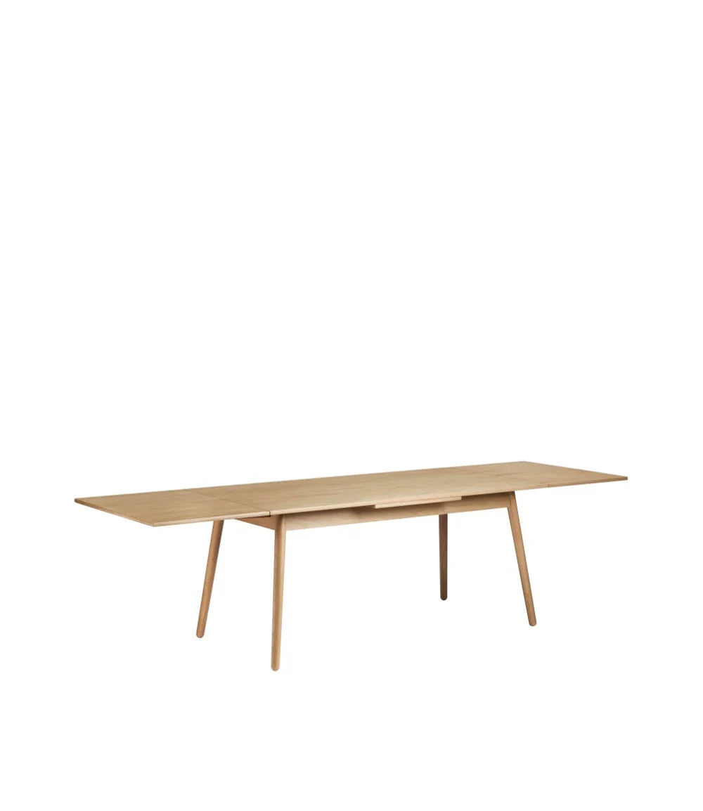 FDB Møbler Dining table With Dutch extract in solid oak, designed by Poul M. Volther
