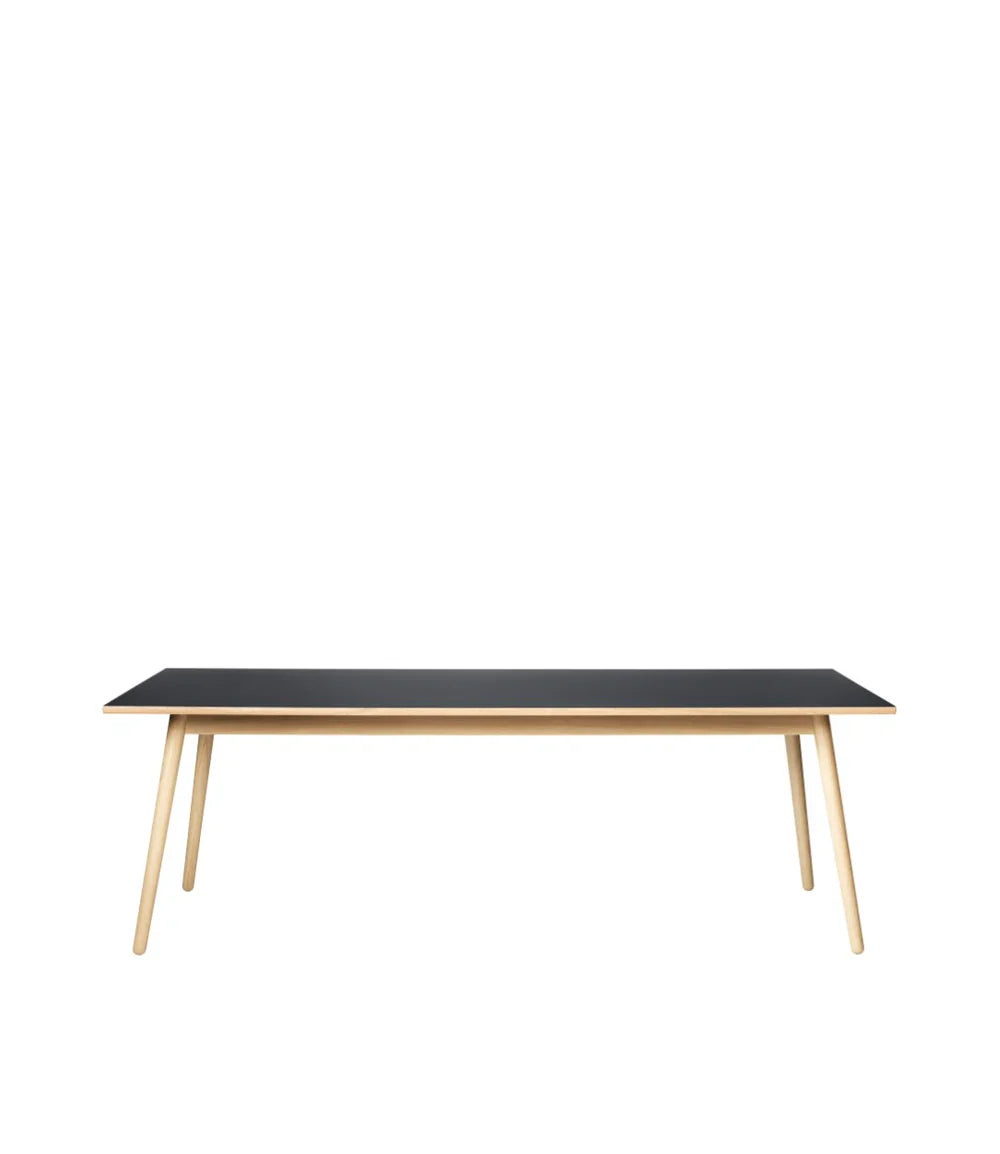FDB Møbler Dining table in solid oak (black), designed by Poul M. Volther