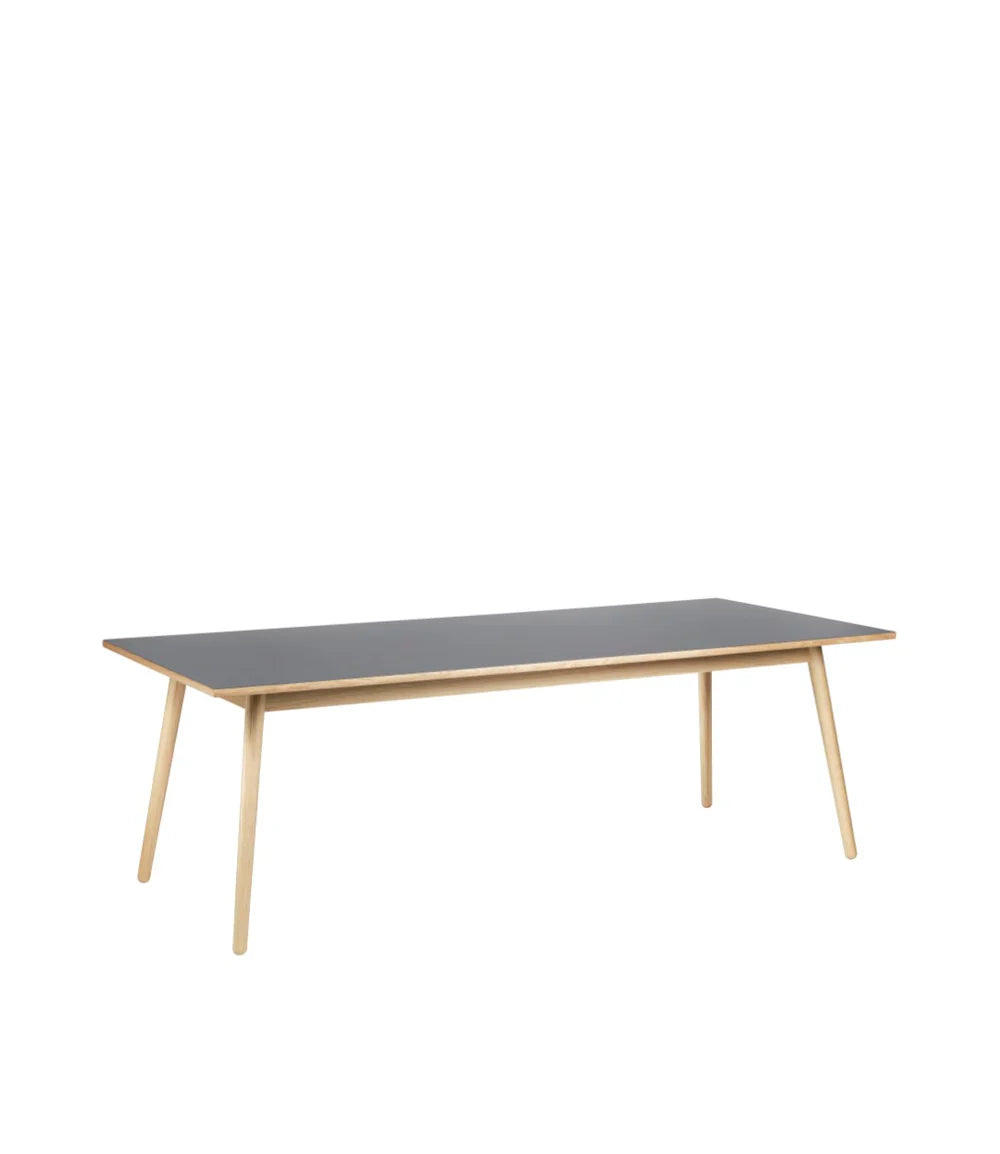 FDB Møbler Dining table in solid oak (dark grey), designed by Poul M. Volther