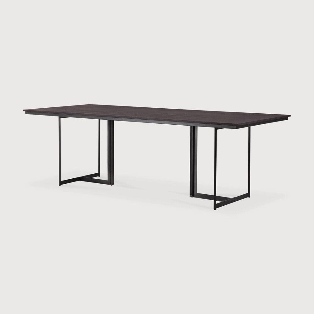 Ethnicraft Tacet Dining Table 94.5 in, three-quarter view, dark brown teak on black metal legs