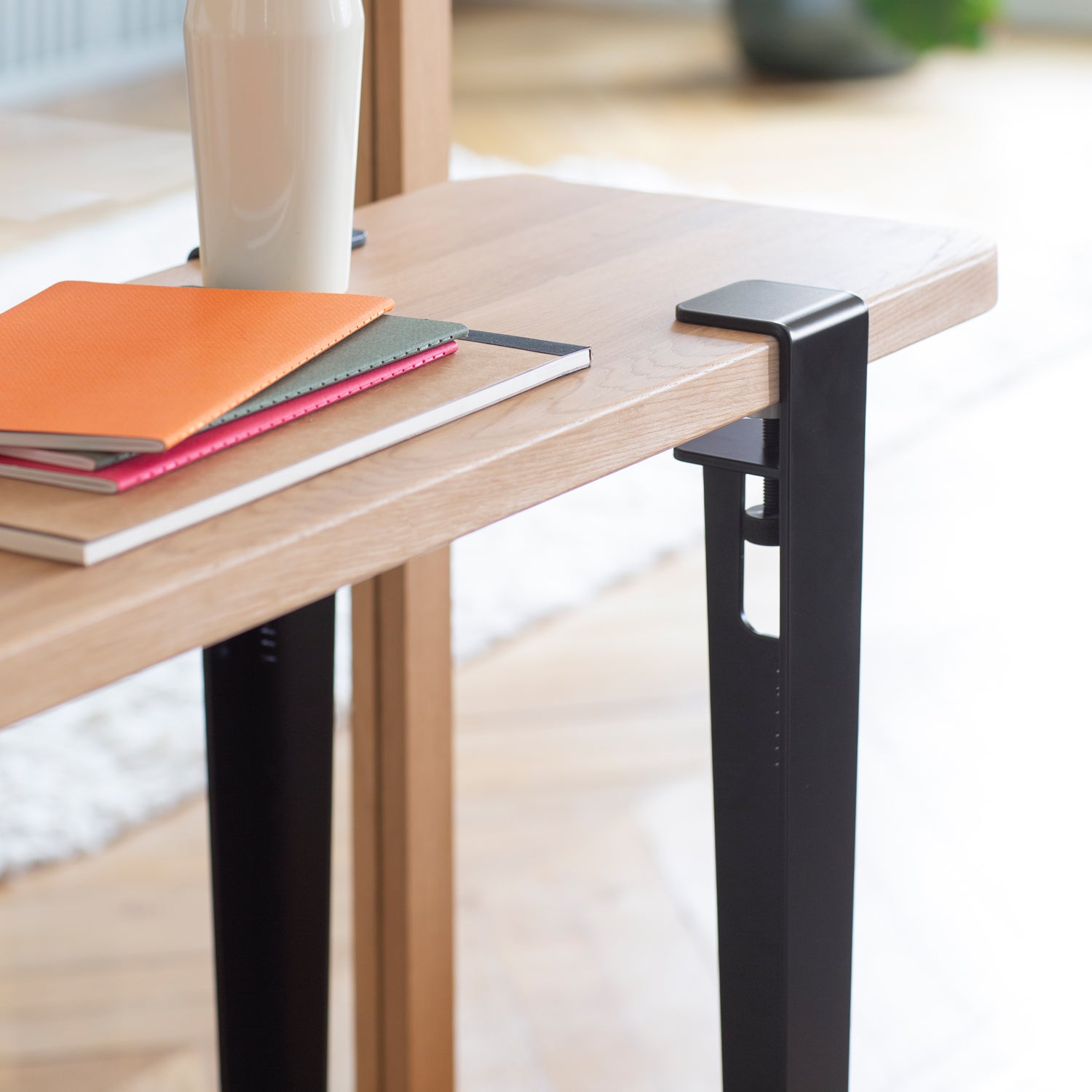 Tiptoe Dining Table with Eco-Certified Wood Top lifestyle photograph