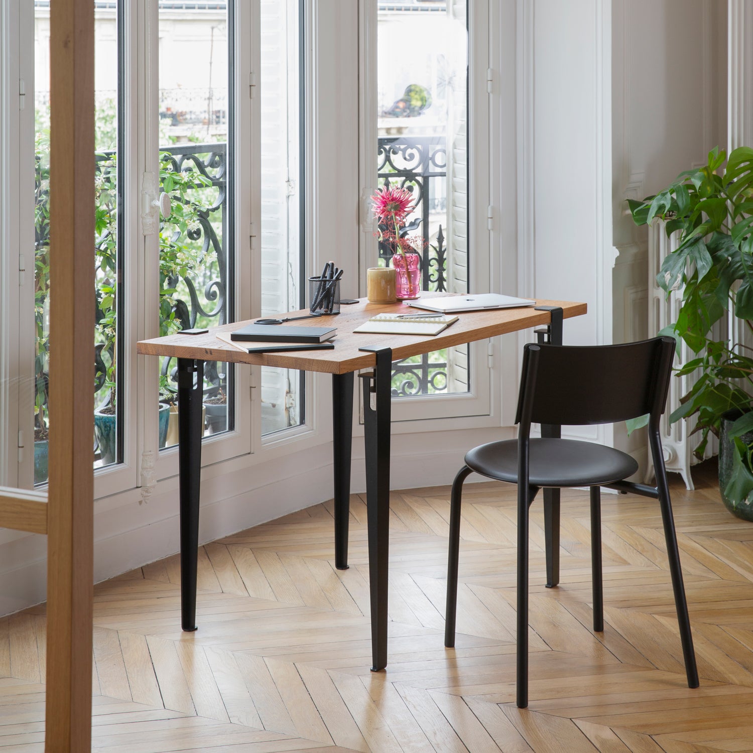 Tiptoe Dining Table with Eco-Certified Wood Top lifestyle photograph