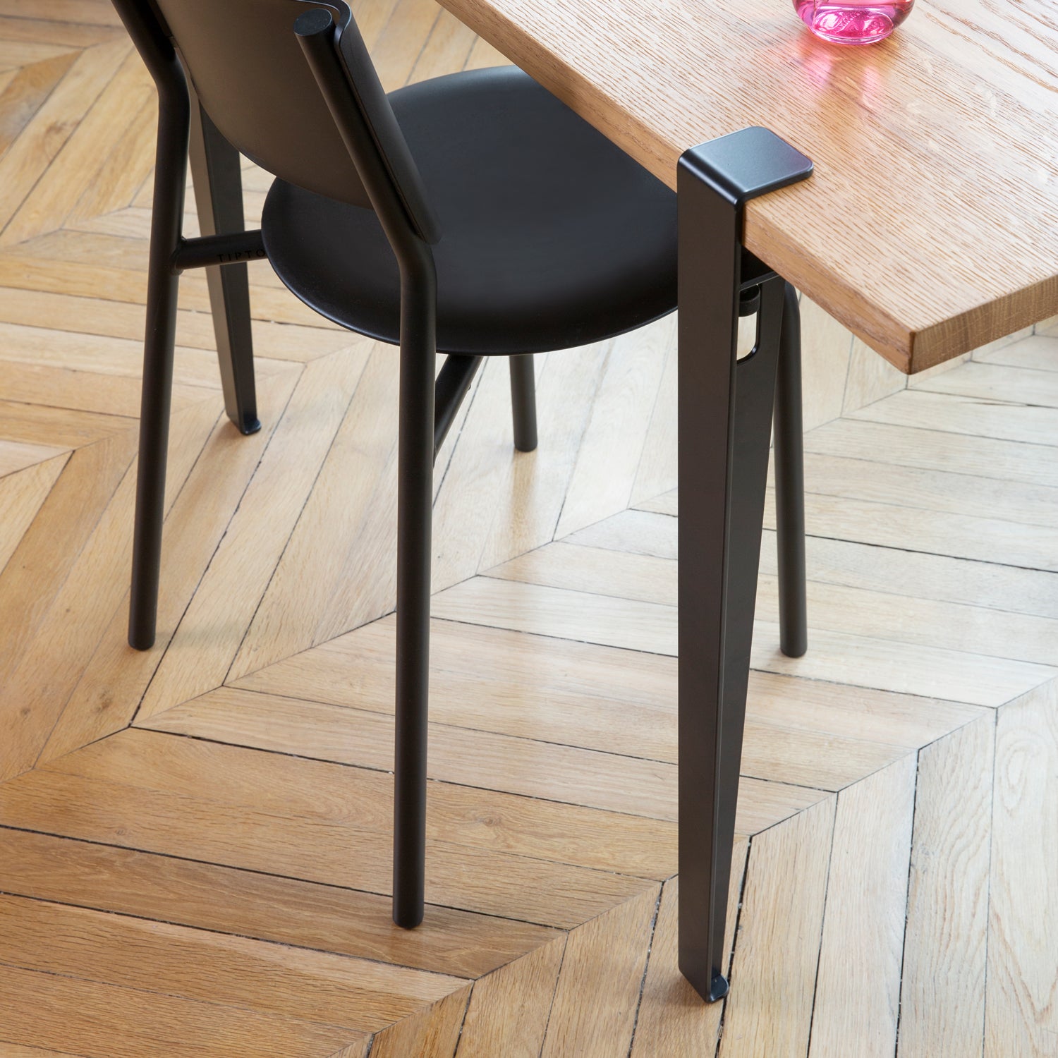 Tiptoe Dining Table with Eco-Certified Wood Top lifestyle photograph