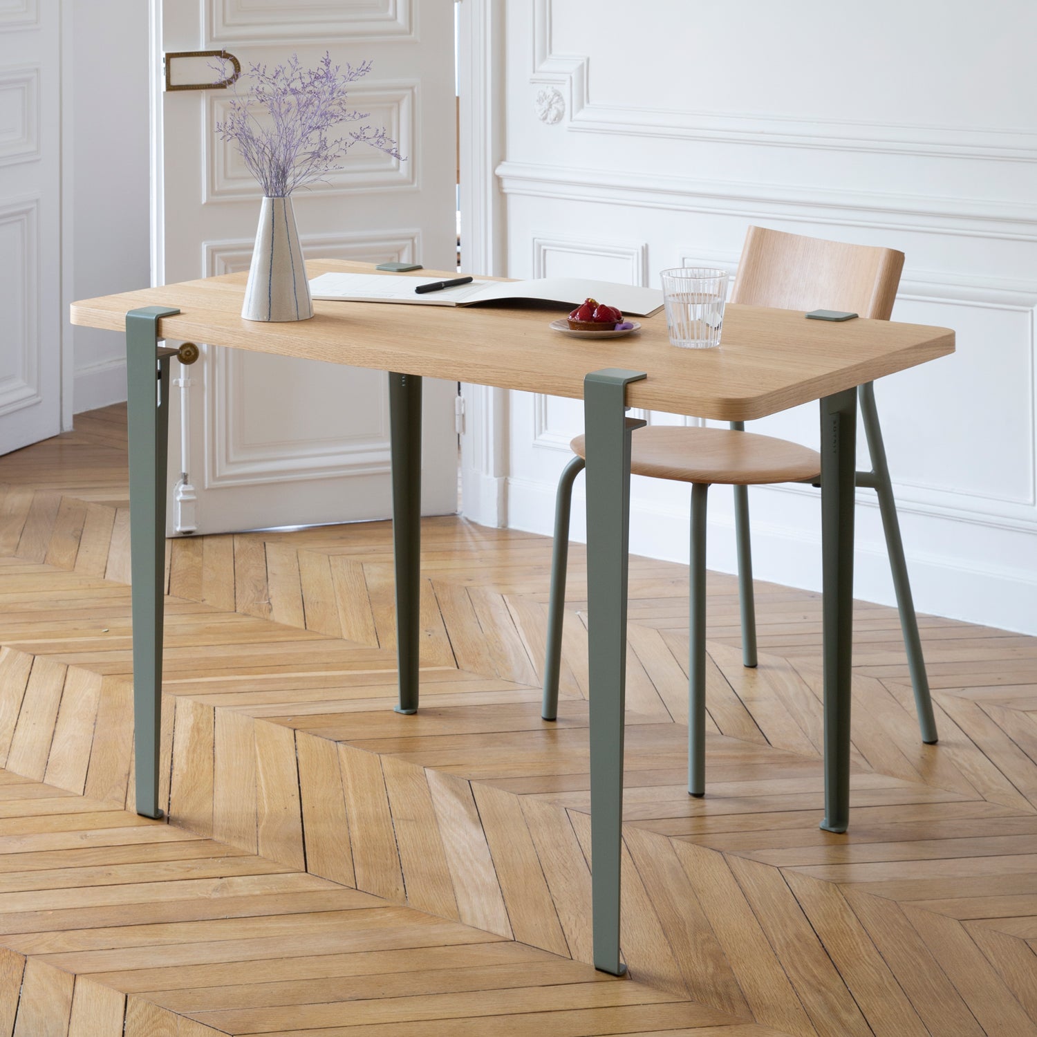 Tiptoe Dining Table with Eco-Certified Wood Top lifestyle photograph
