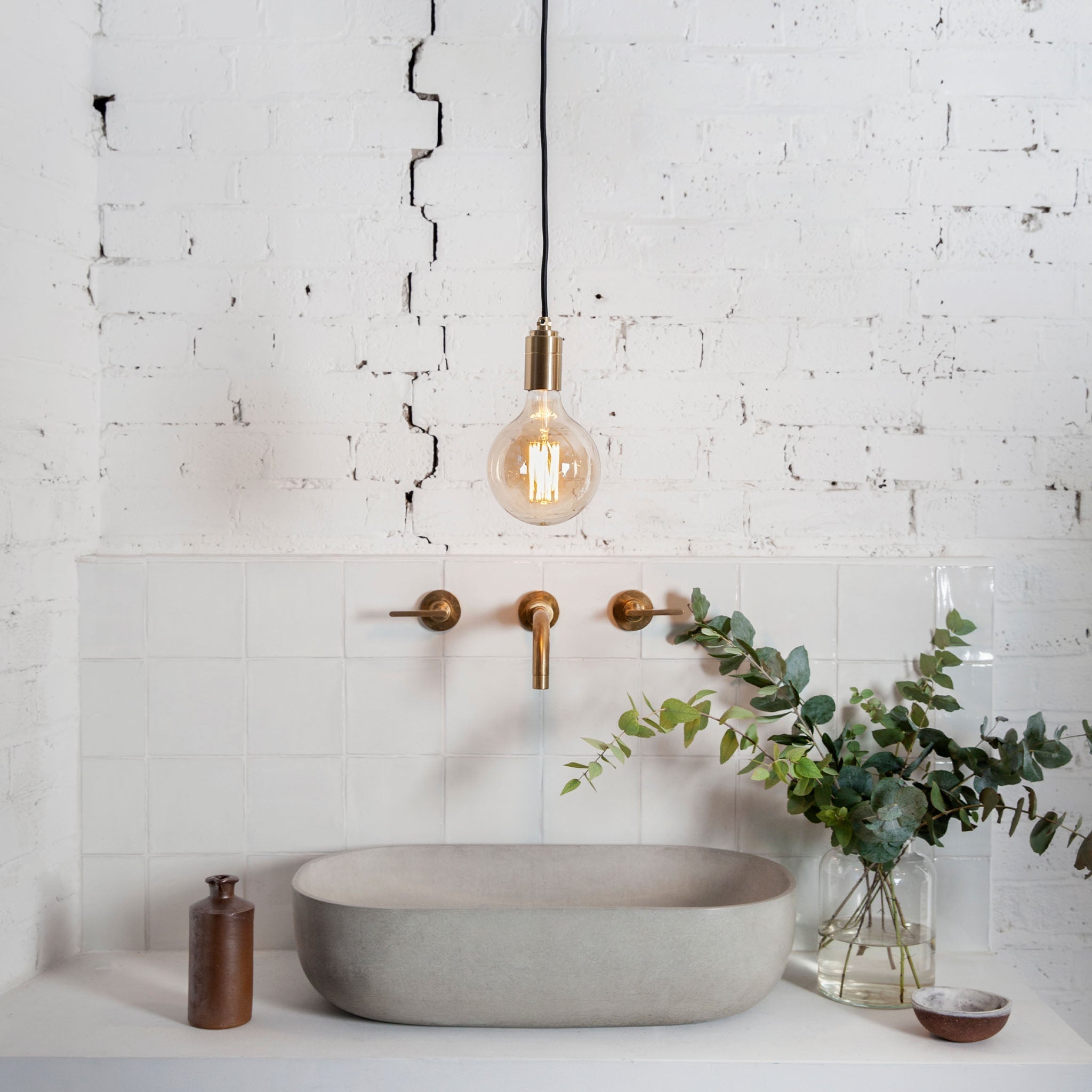 Three-quarter angle of the Gaia Pendant Light in Brass